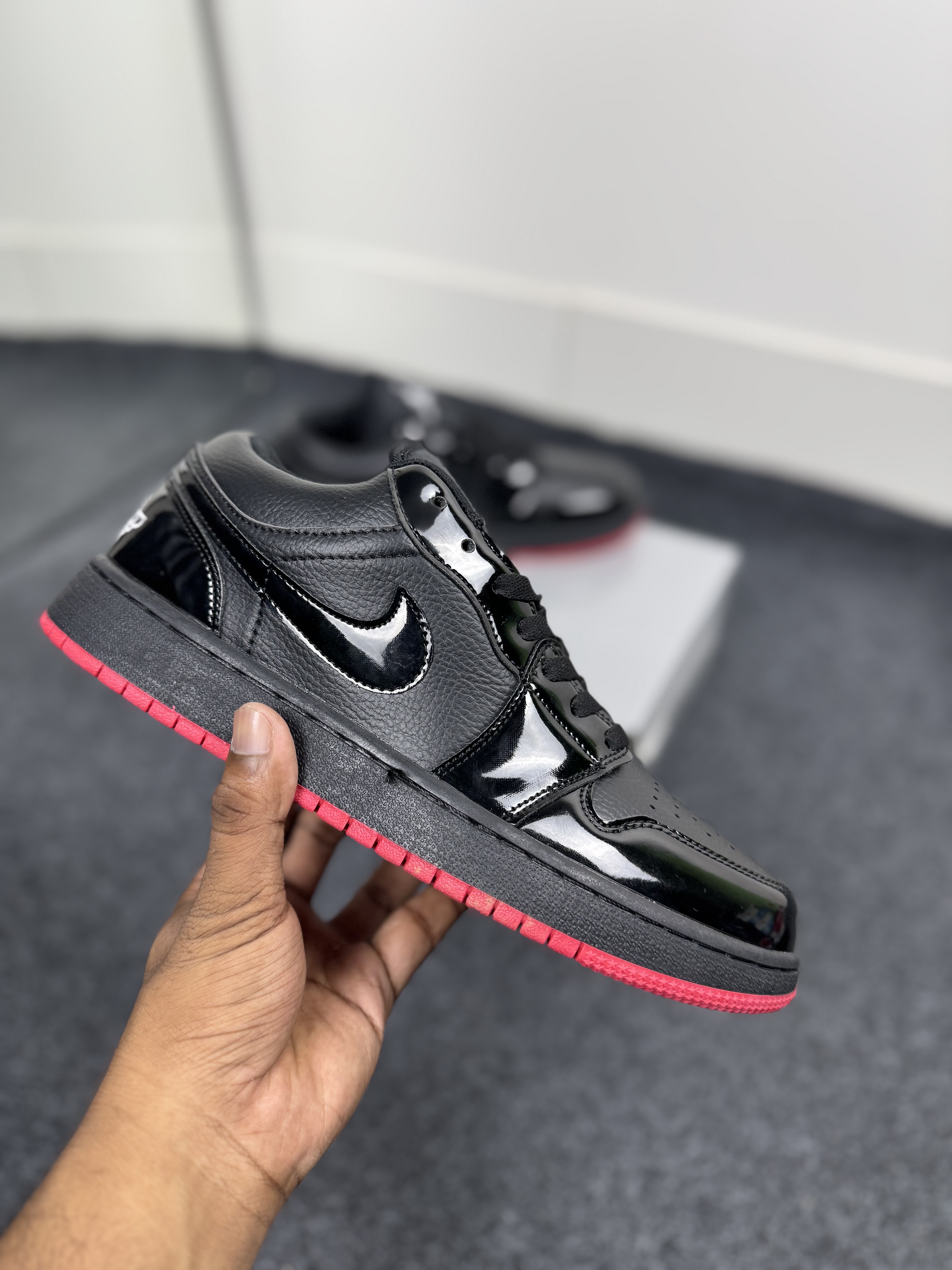 Air Jordan 1 Low: "glossy black & red outsole" thumbnail 2