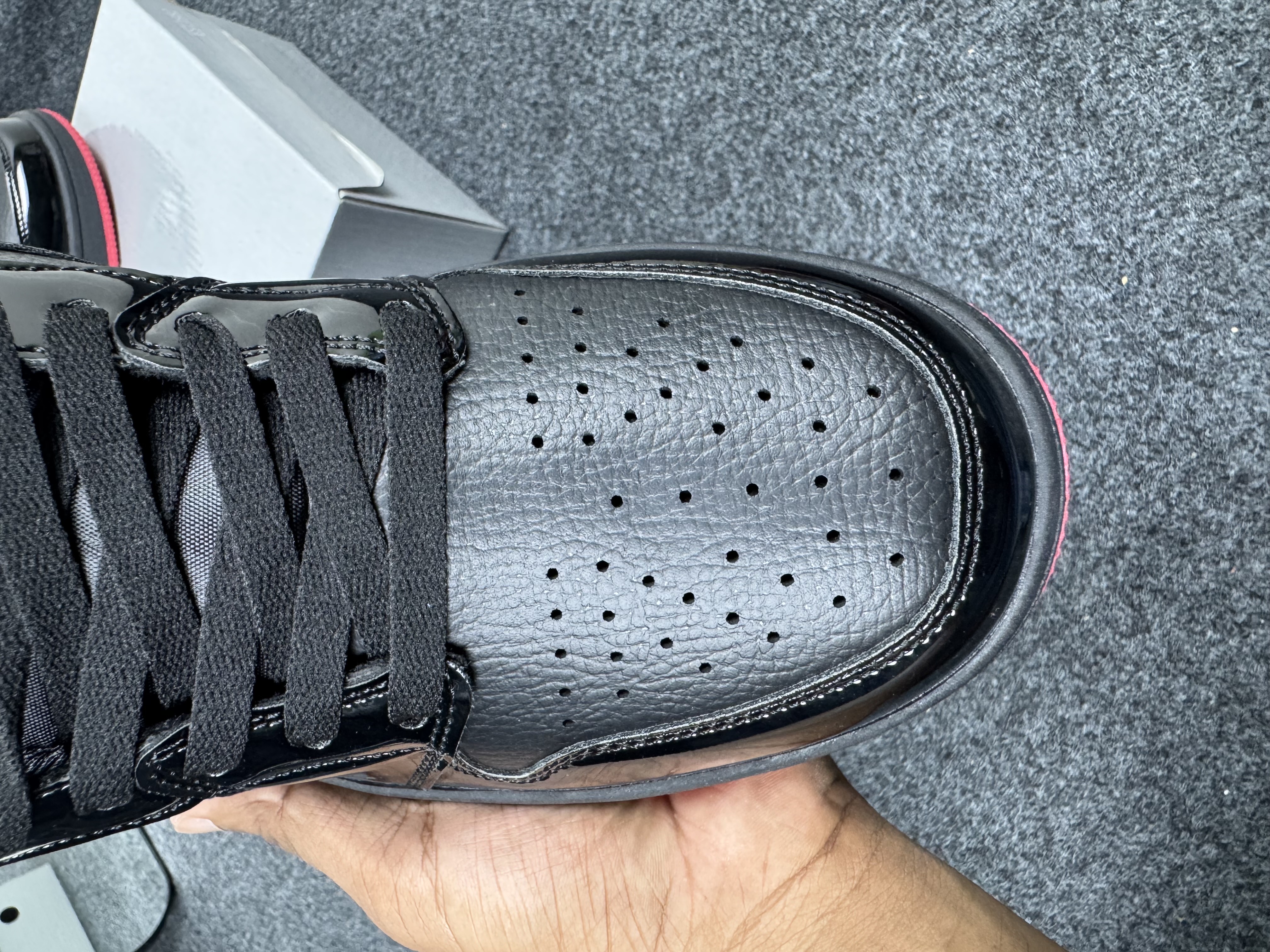 Air Jordan 1 Low: "glossy black & red outsole" thumbnail 7