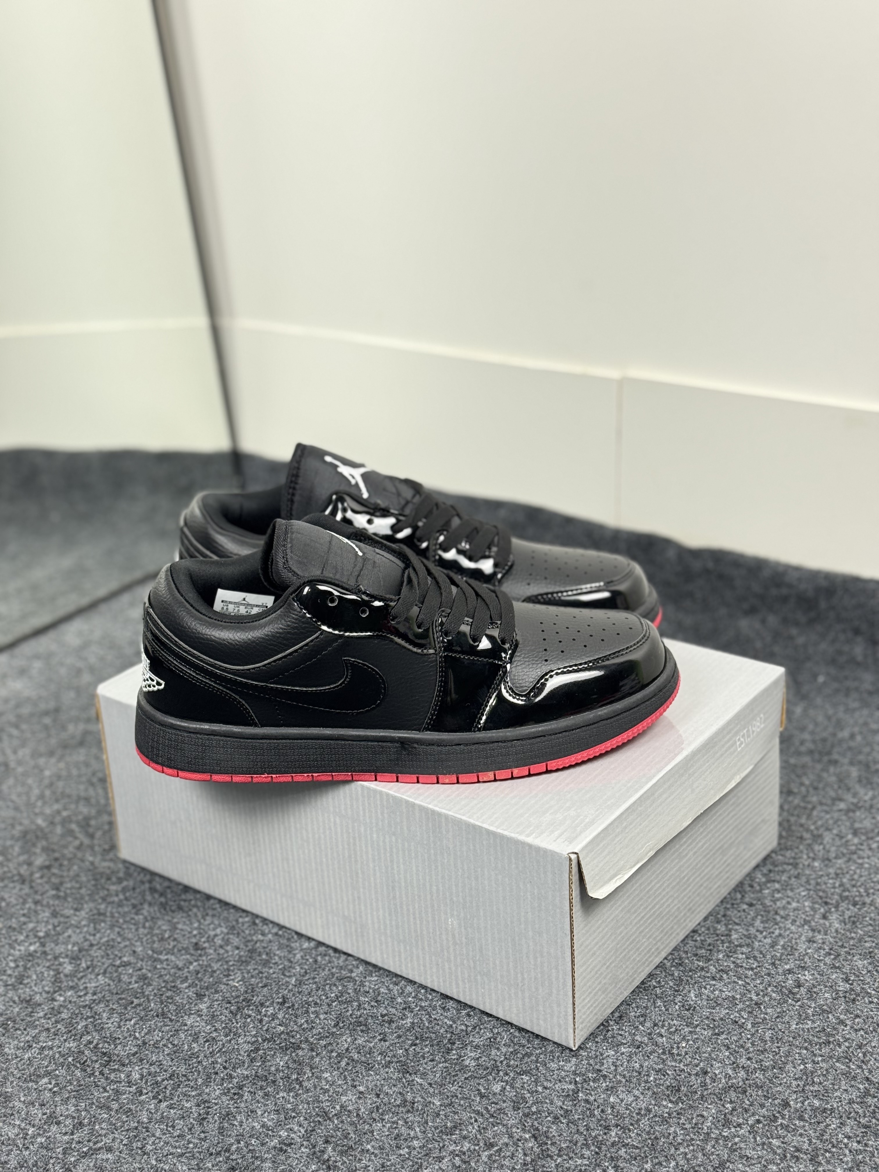 Air Jordan 1 Low: "glossy black & red outsole" thumbnail 3