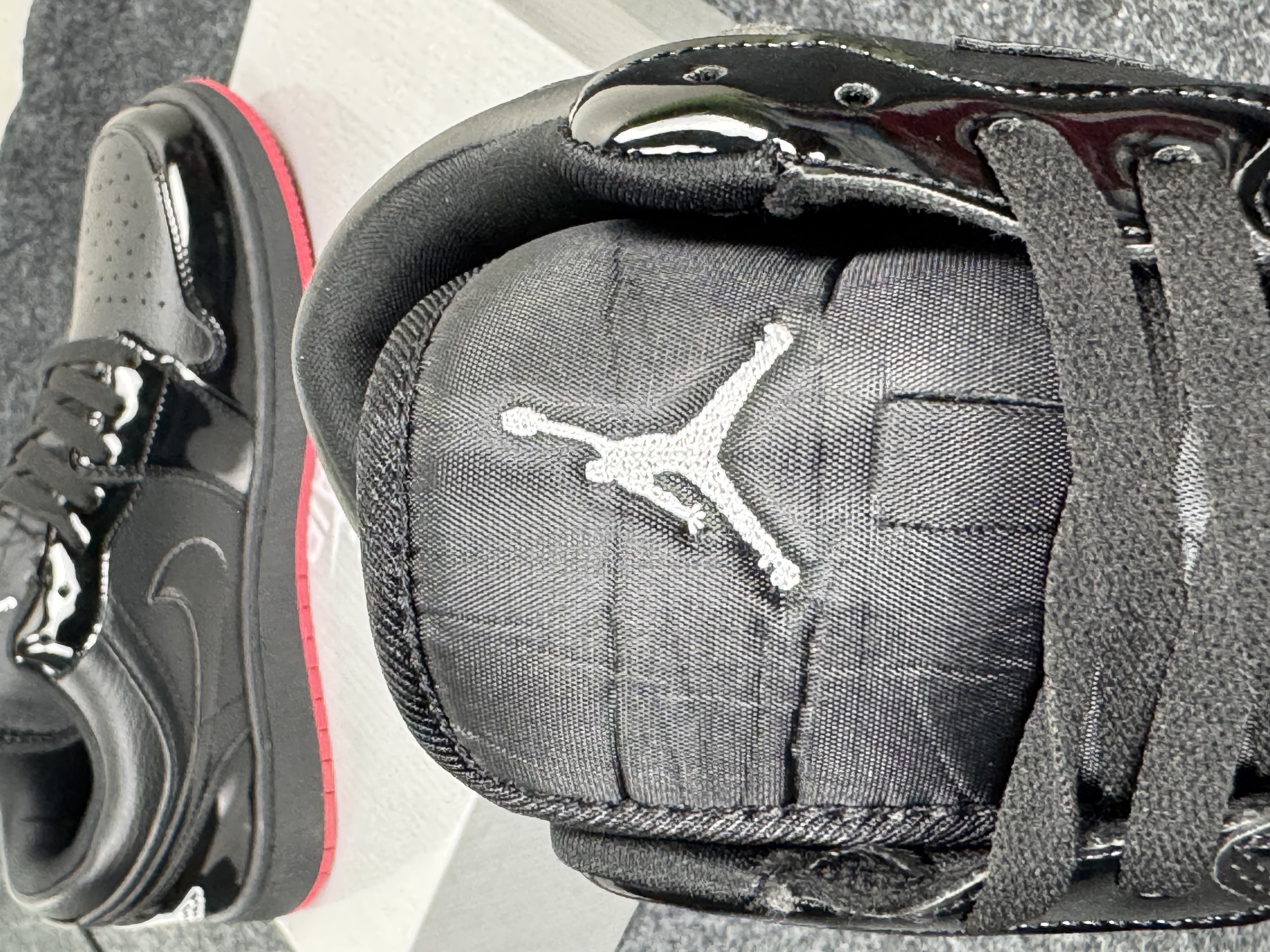 Air Jordan 1 Low: "glossy black & red outsole" thumbnail 8