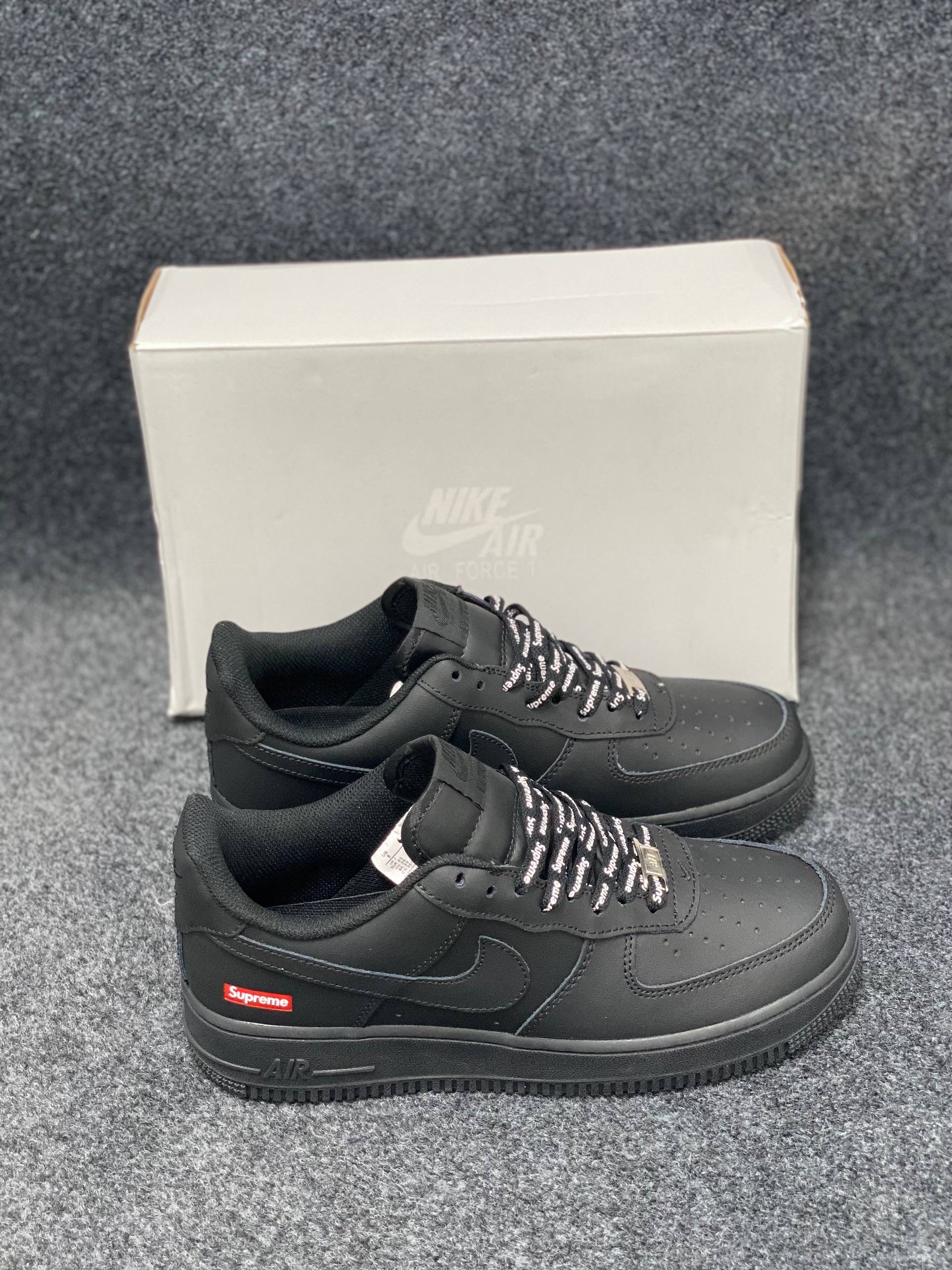 Nike x Supreme Air Force 1 Low: "Black" featuring signature red "Supreme "box logo