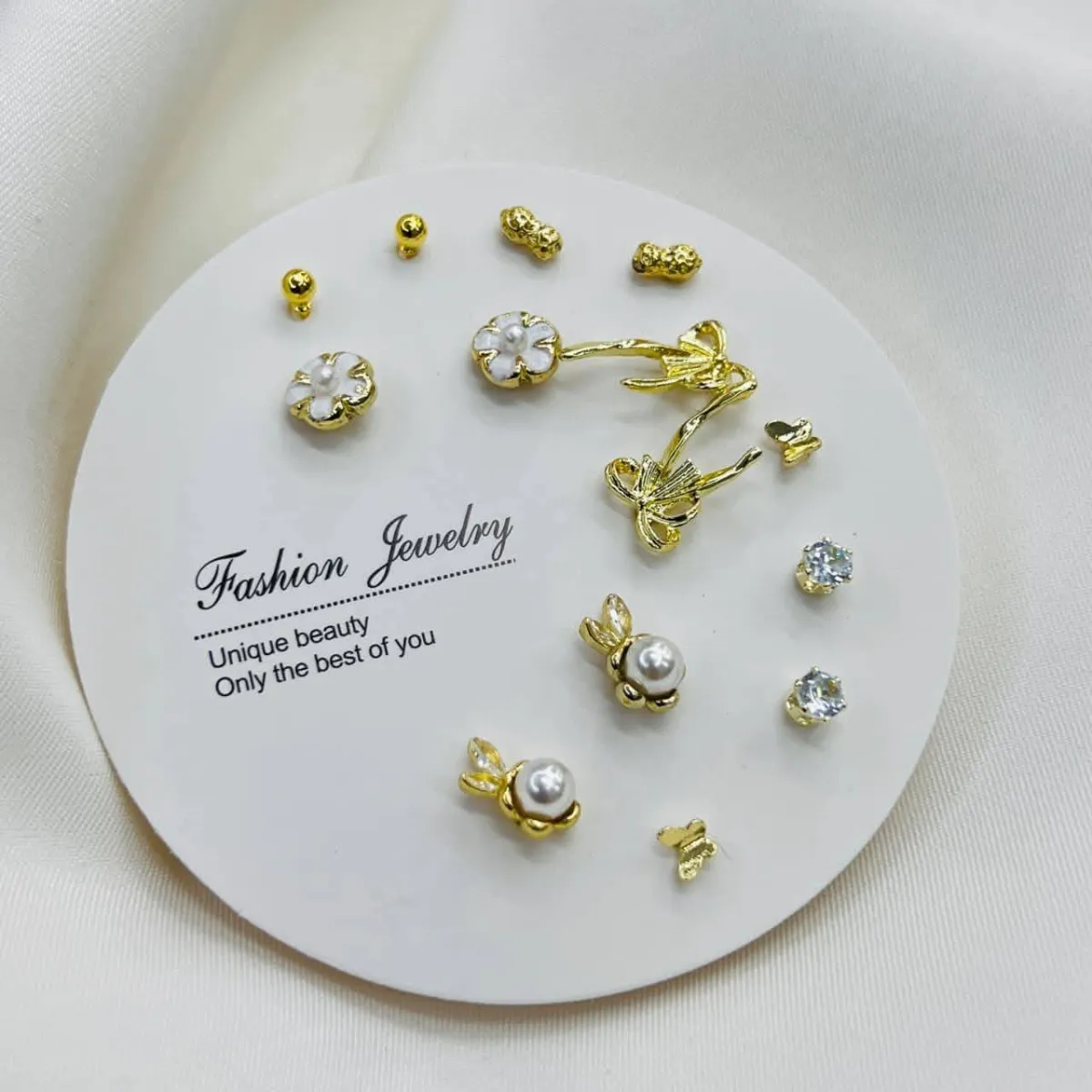Elegant Mix & Match Earrings Set (7 Pairs) - Golden bow flower - Image 1