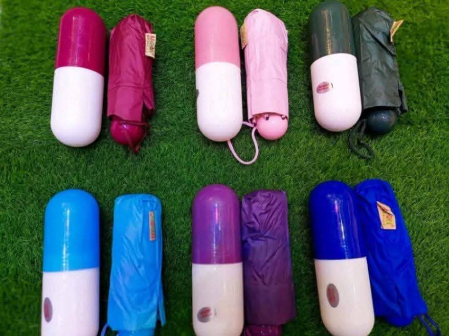 Premium Folding Capsule Umbrella – Ultra Lightweight Portable Mini Pocket Umbrella with Case thumbnail 7