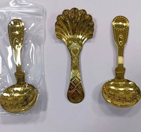 decorative golden dessert and serving spoons - Image 1