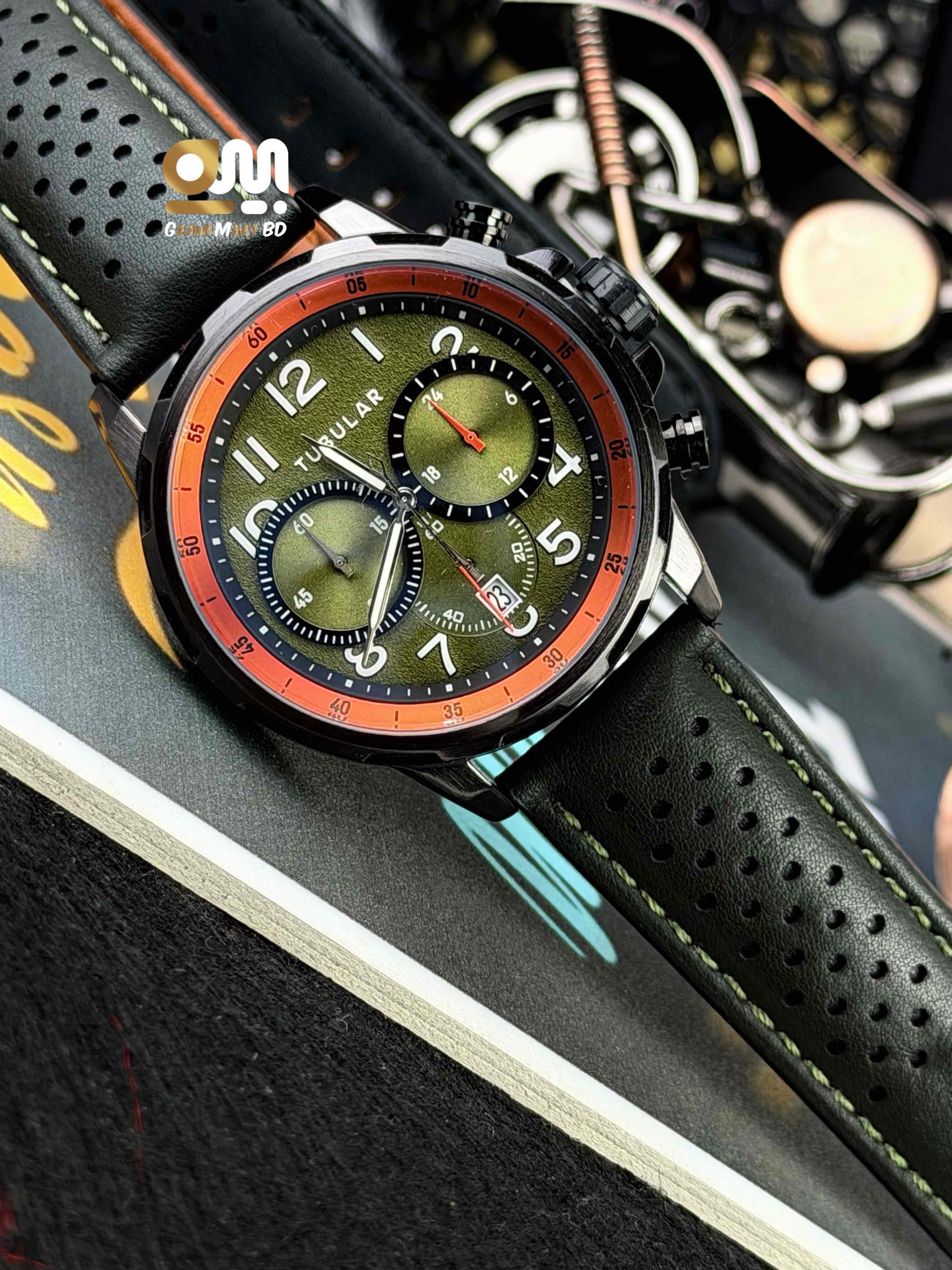 Tubular Chronograph men's sports watch featuring a green textured dial with orange accents and a black perforated leather strap._img_1