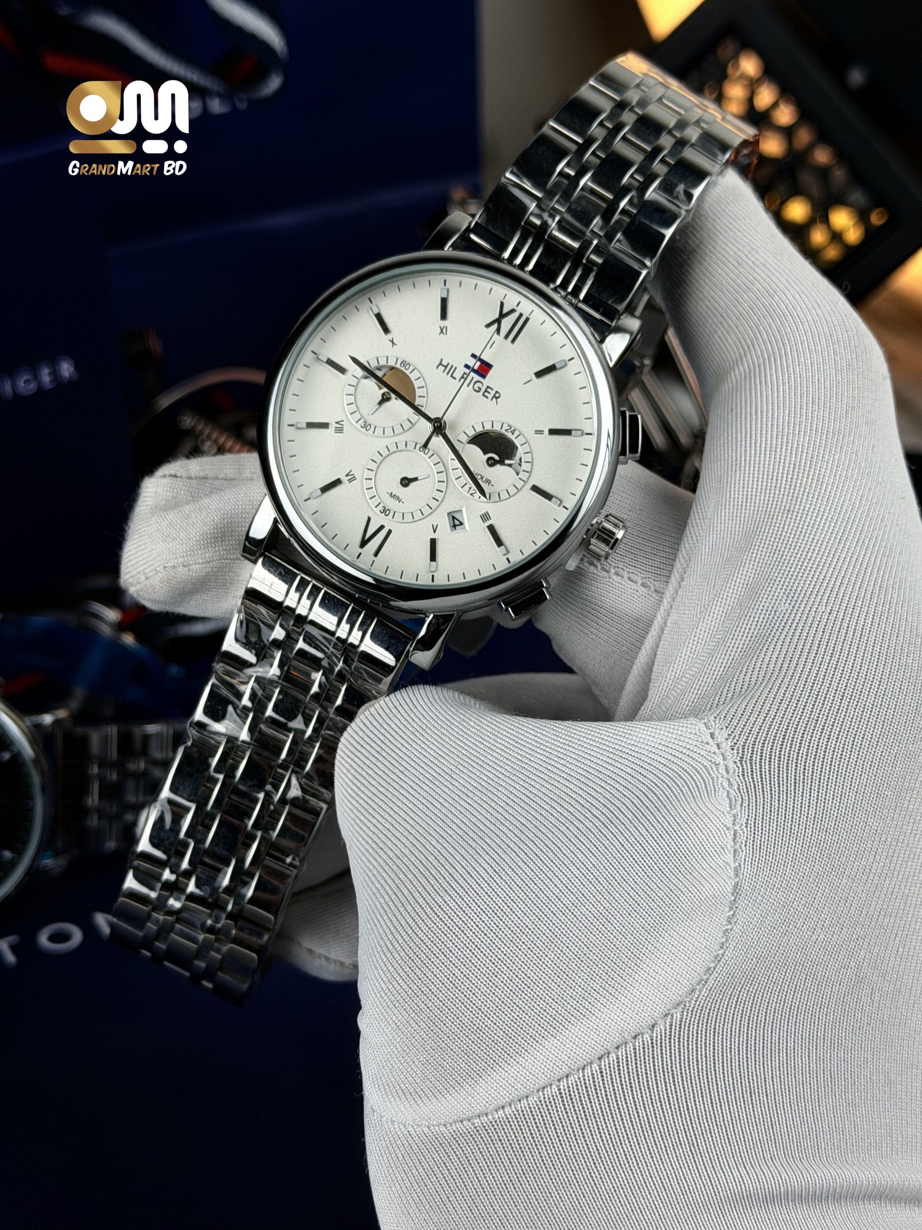 Tommy Hilfiger stainless steel men's watch featuring a black dial and  Silver chain