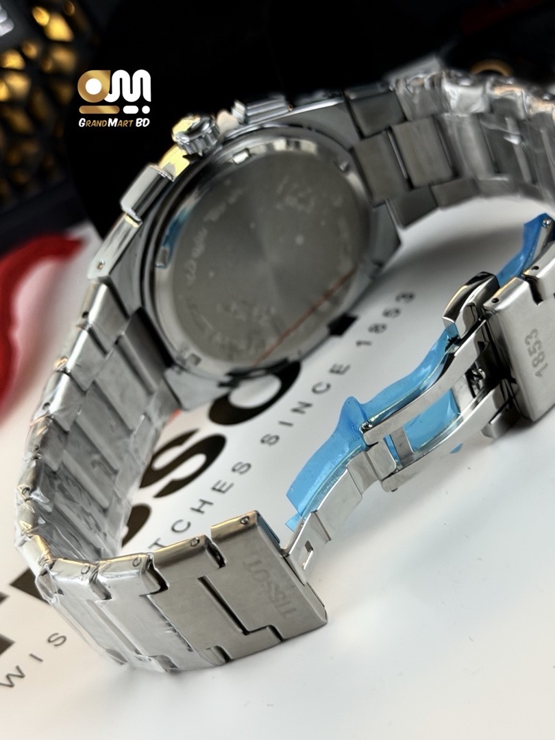 Tissot PRX Chronograph wristwatch featuring a black dial, silver-tone triple-register sub-dials, a stainless steel integrated bracelet, and a quartz movement._img_2
