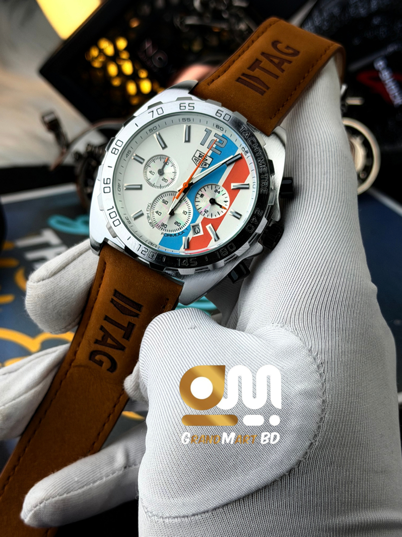 TAG Heuer Formula 1 Chronograph watch with a white dial and racing stripes on a camel brown leather strap._img_1