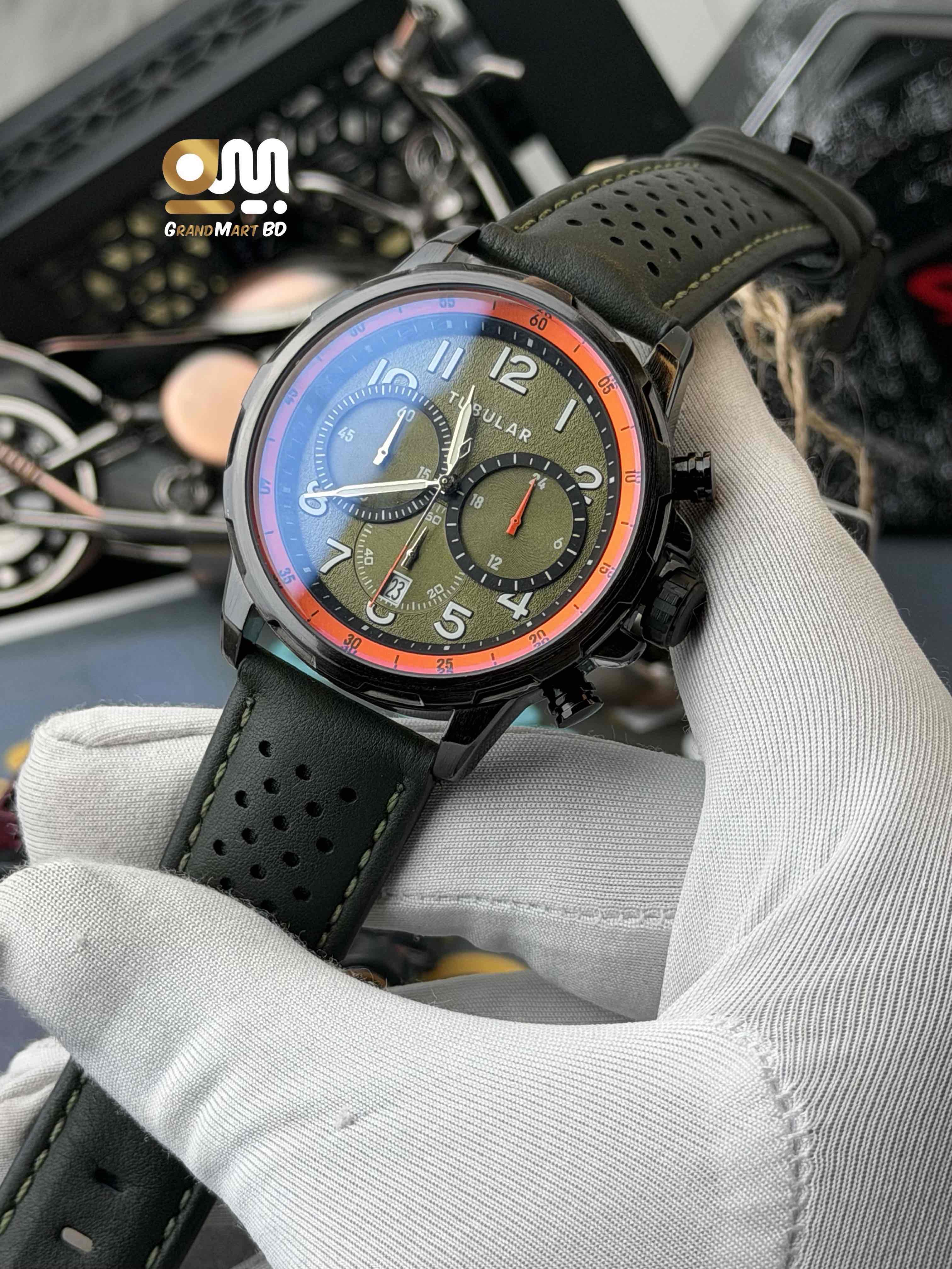 Tubular Chronograph men's sports watch featuring a green textured dial with orange accents and a black perforated leather strap.