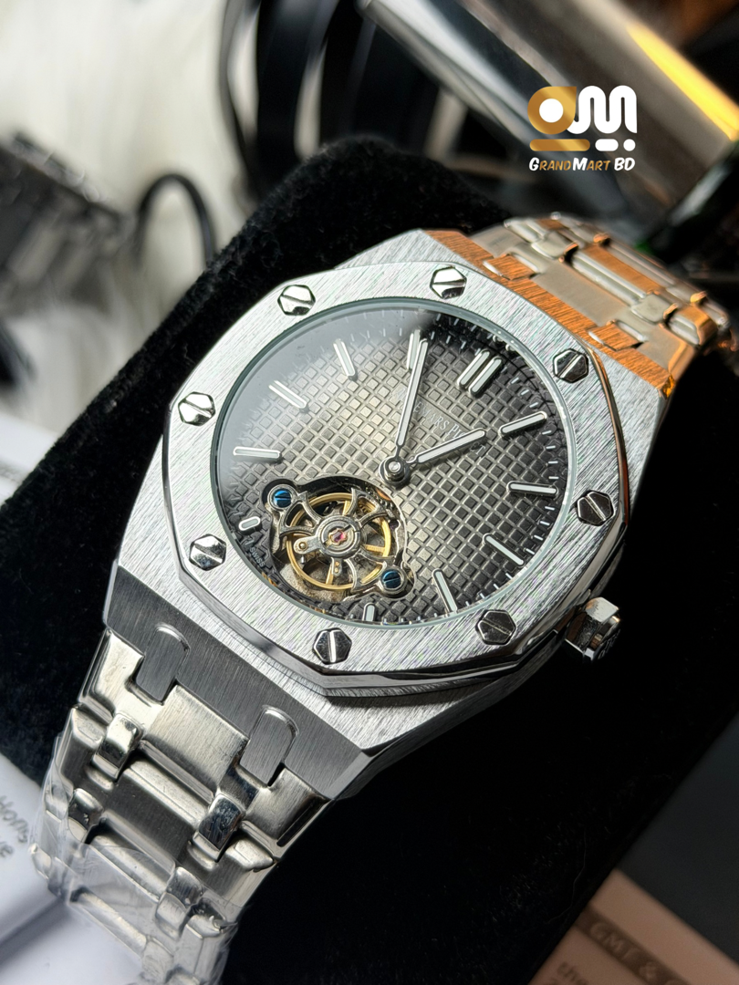 Audemars Piguet Royal Oak ||tourbillon watch with a textured black dial.