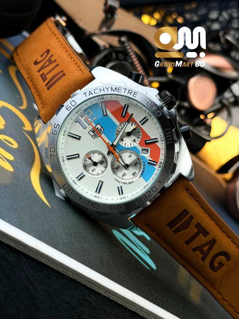 TAG Heuer Formula 1 Chronograph watch with a white dial and racing stripes on a camel brown leather strap.