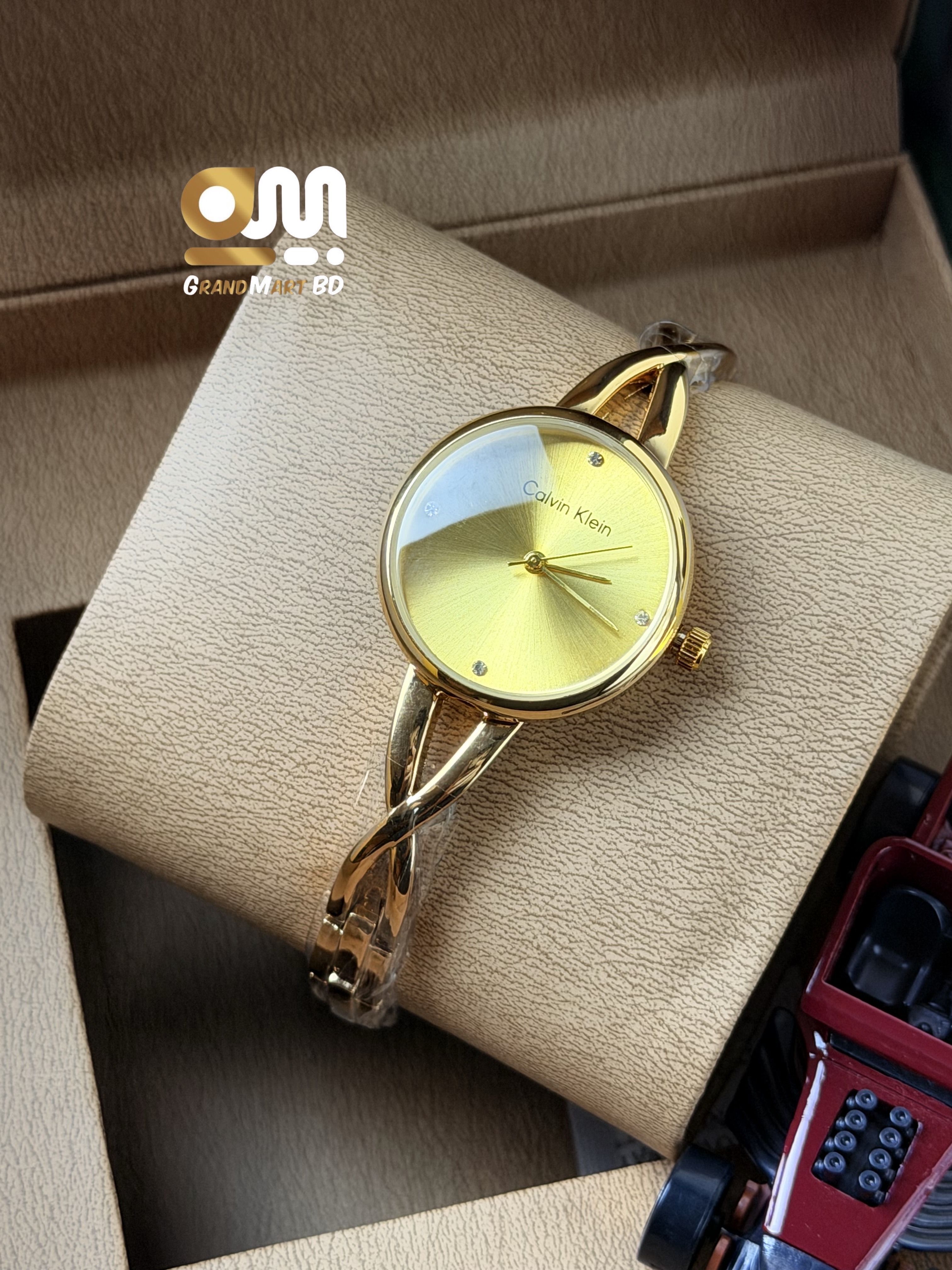 CK Golden Oval Dial