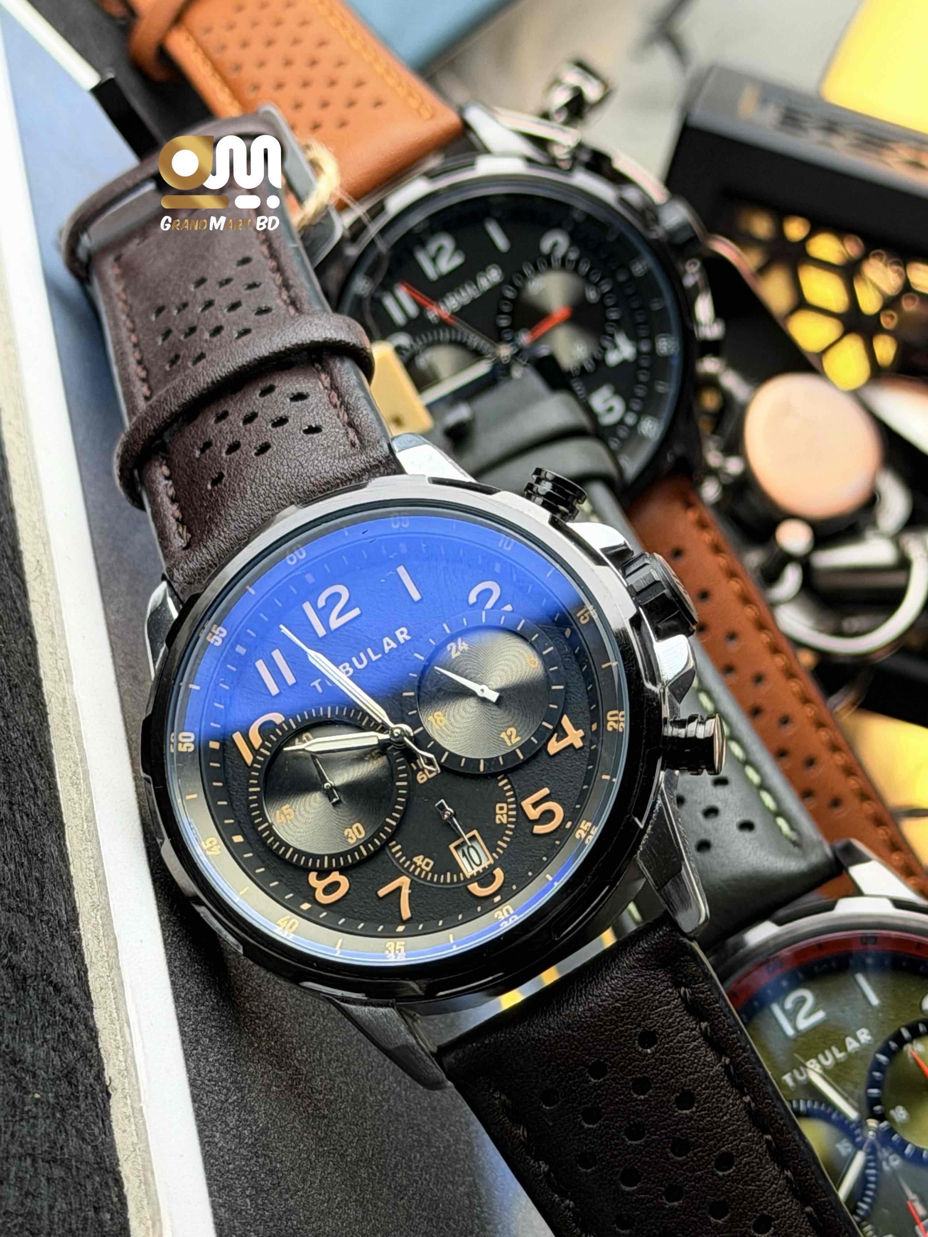 Tubular Analog Quartz Chronograph Watch featuring a dark textured dial with orange numerical markers and a perforated brown leather strap_img_1