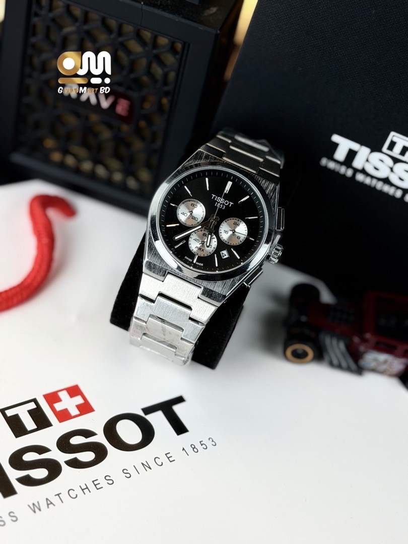 Tissot PRX Chronograph wristwatch featuring a black dial, silver-tone triple-register sub-dials, a stainless steel integrated bracelet, and a quartz movement._img_1