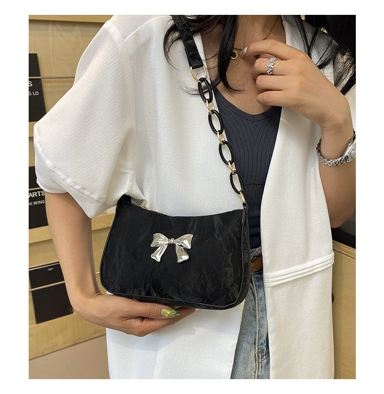 Butterfly valvet shoulder bag
