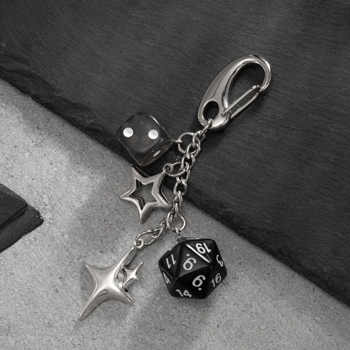 Y2K-inspired dice and star charm keychain/bag charm with a silver-tone metal finish - Image 3