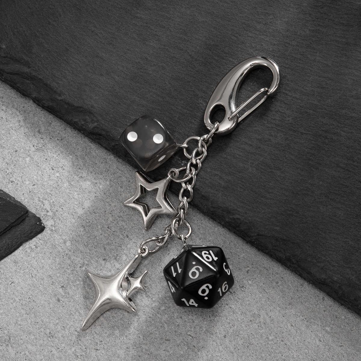 Y2K-inspired dice and star charm keychain/bag charm with a silver-tone metal finish - Image 3
