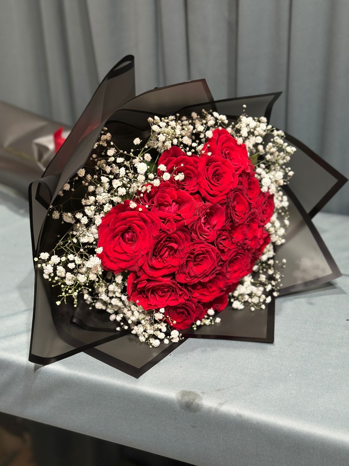 Red and black hand bouquet