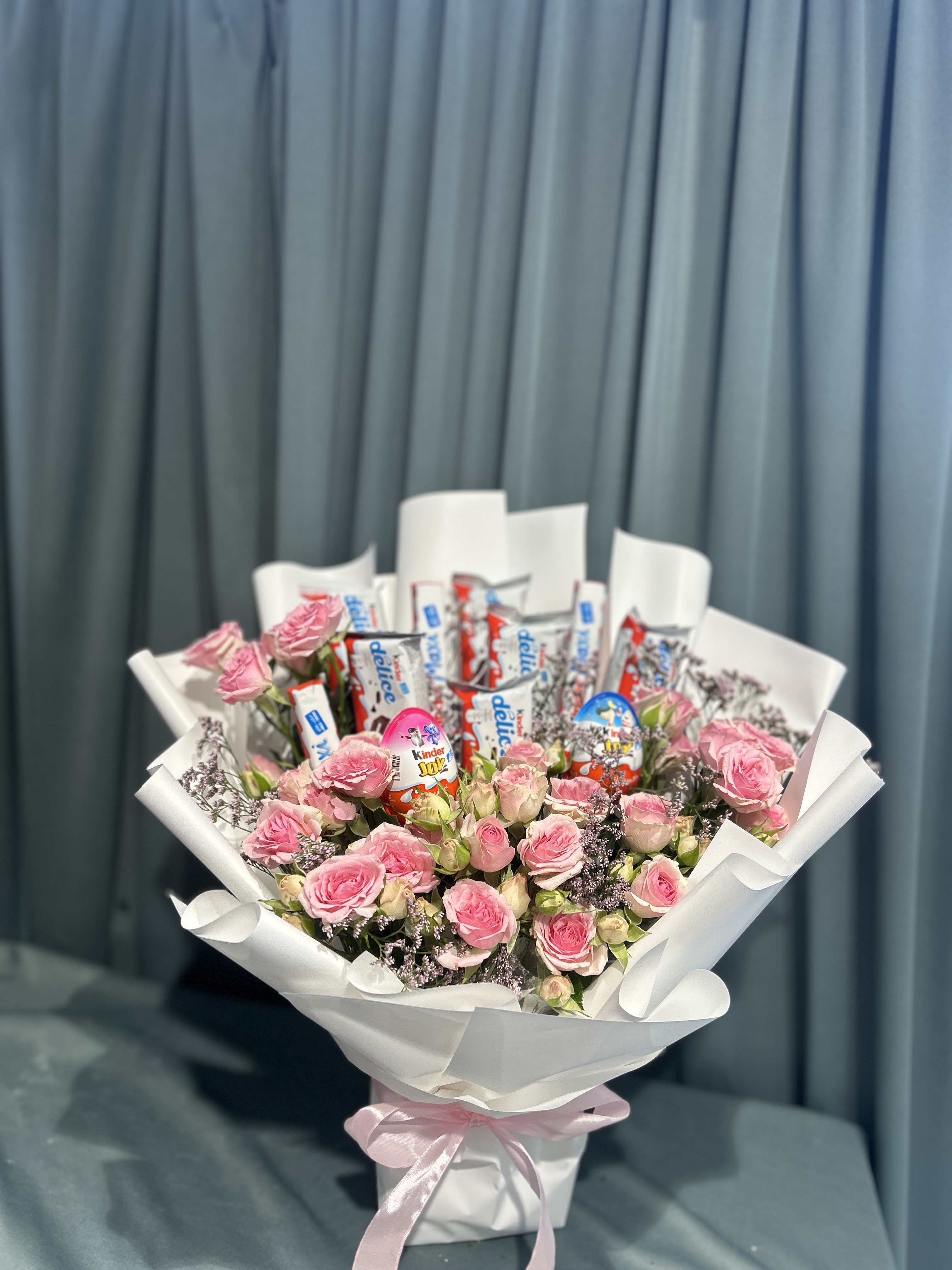 Chocolates with flowers bouquet
