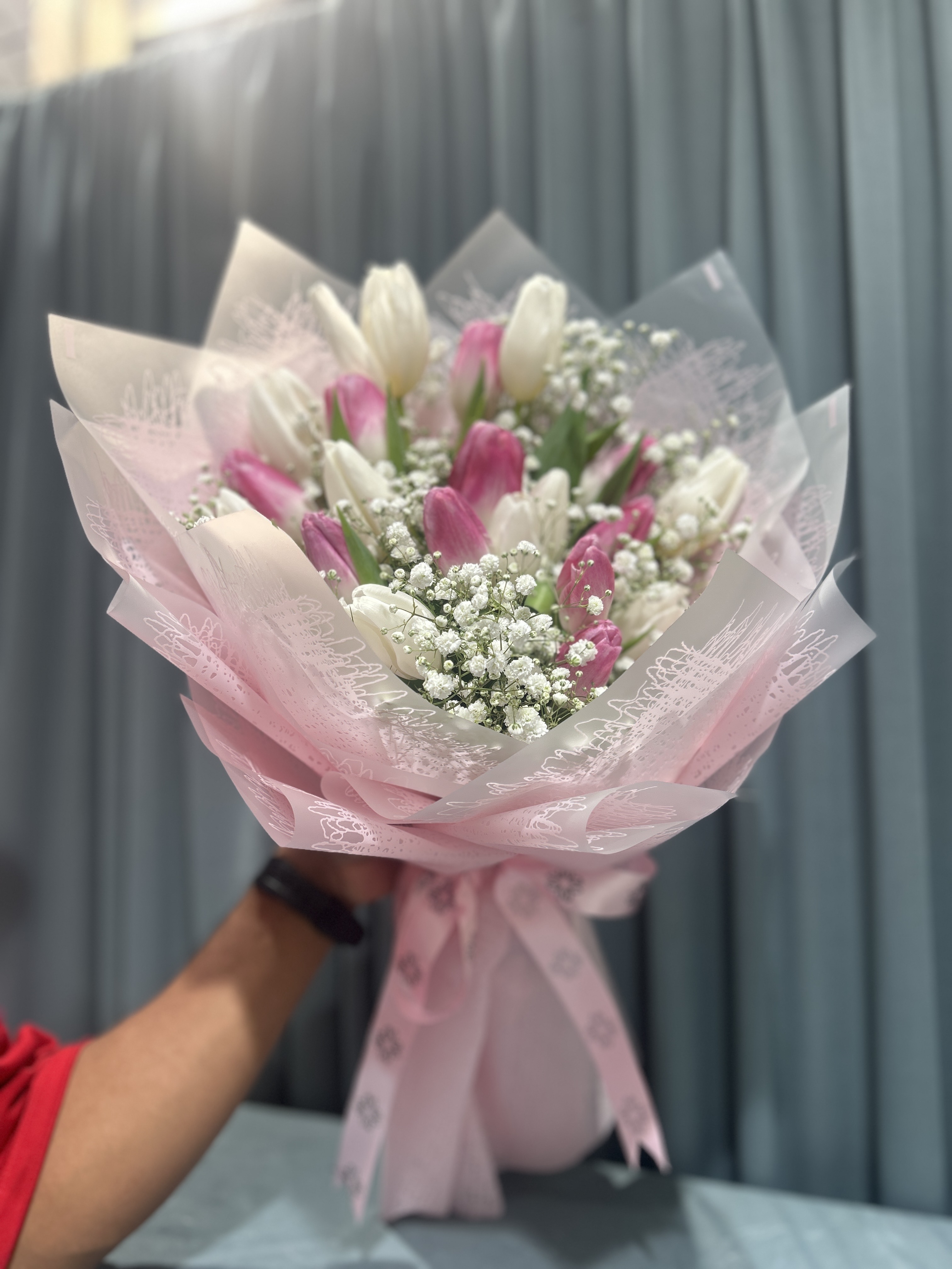 Tulip flowers hand  bouquet