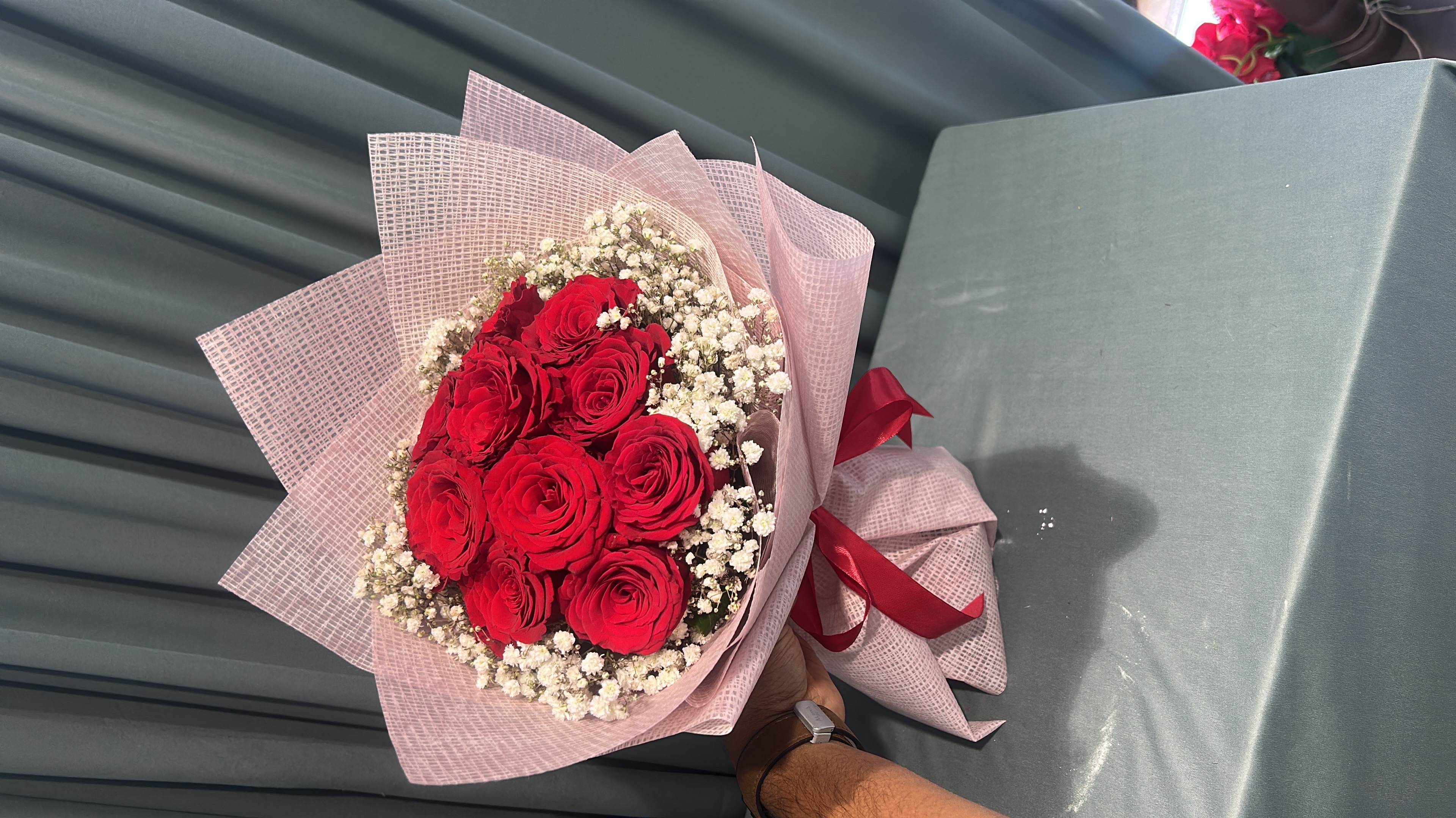 Red and pink hand bouquet