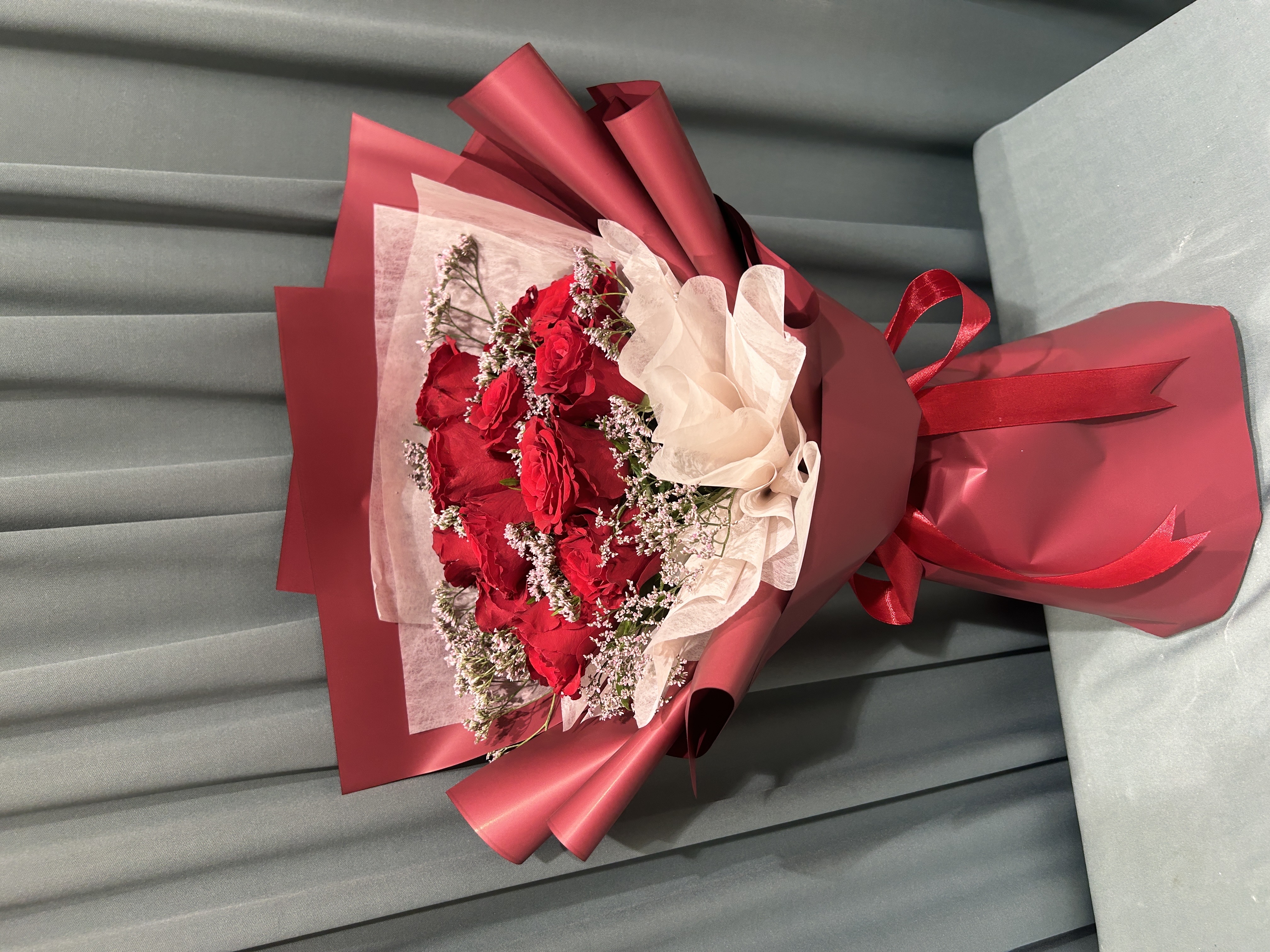 Red and pink hand bouquet