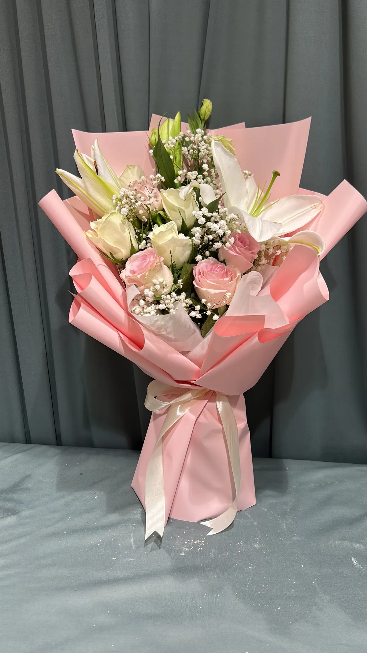 Pink and white hand bouquet
