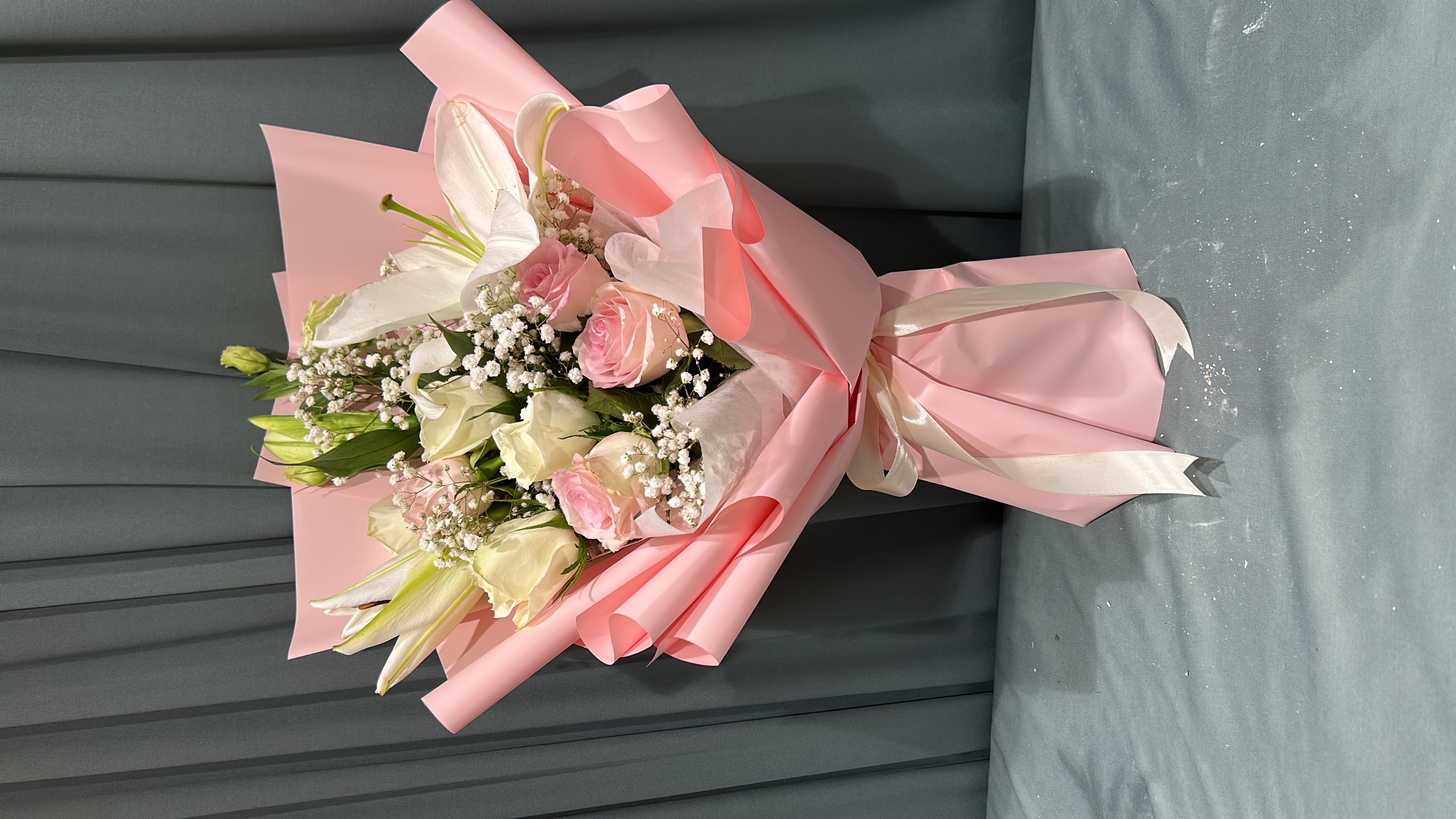 Pink and white hand bouquet
