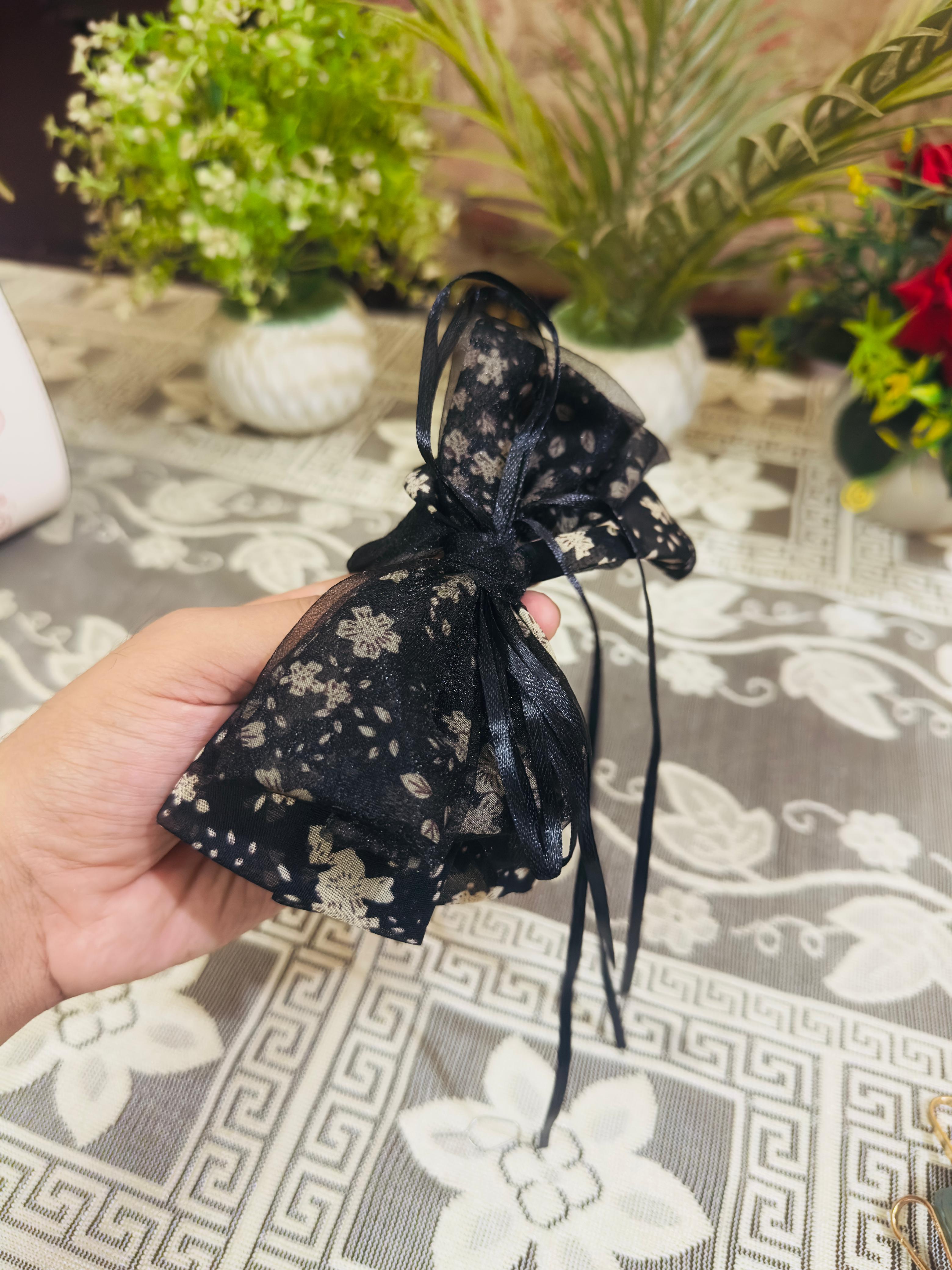 Classic Black Bow Hair Clip with Crystal Centerpiece