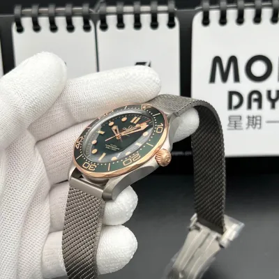 Omega Seamaster Diver 300M – Crafted from Grade 2 Titanium and 9K Bronze Gold, Featuring a Green Aluminum Dial and Matching Bezel with a Mesh Bracelet. Swiss 1:1 Grade (Pre-Order)_img_6