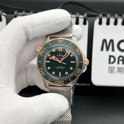 Omega Seamaster Diver 300M – Crafted from Grade 2 Titanium and 9K Bronze Gold, Featuring a Green Aluminum Dial and Matching Bezel with a Mesh Bracelet. Swiss 1:1 Grade (Pre-Order)_img_0