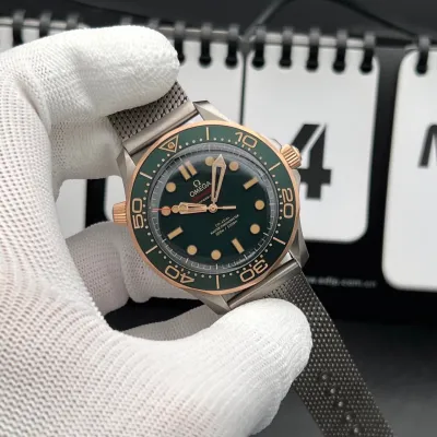 Omega Seamaster Diver 300M – Crafted from Grade 2 Titanium and 9K Bronze Gold, Featuring a Green Aluminum Dial and Matching Bezel with a Mesh Bracelet. Swiss 1:1 Grade (Pre-Order)_img_1