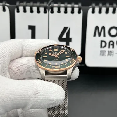 Omega Seamaster Diver 300M – Crafted from Grade 2 Titanium and 9K Bronze Gold, Featuring a Green Aluminum Dial and Matching Bezel with a Mesh Bracelet. Swiss 1:1 Grade (Pre-Order)_img_4