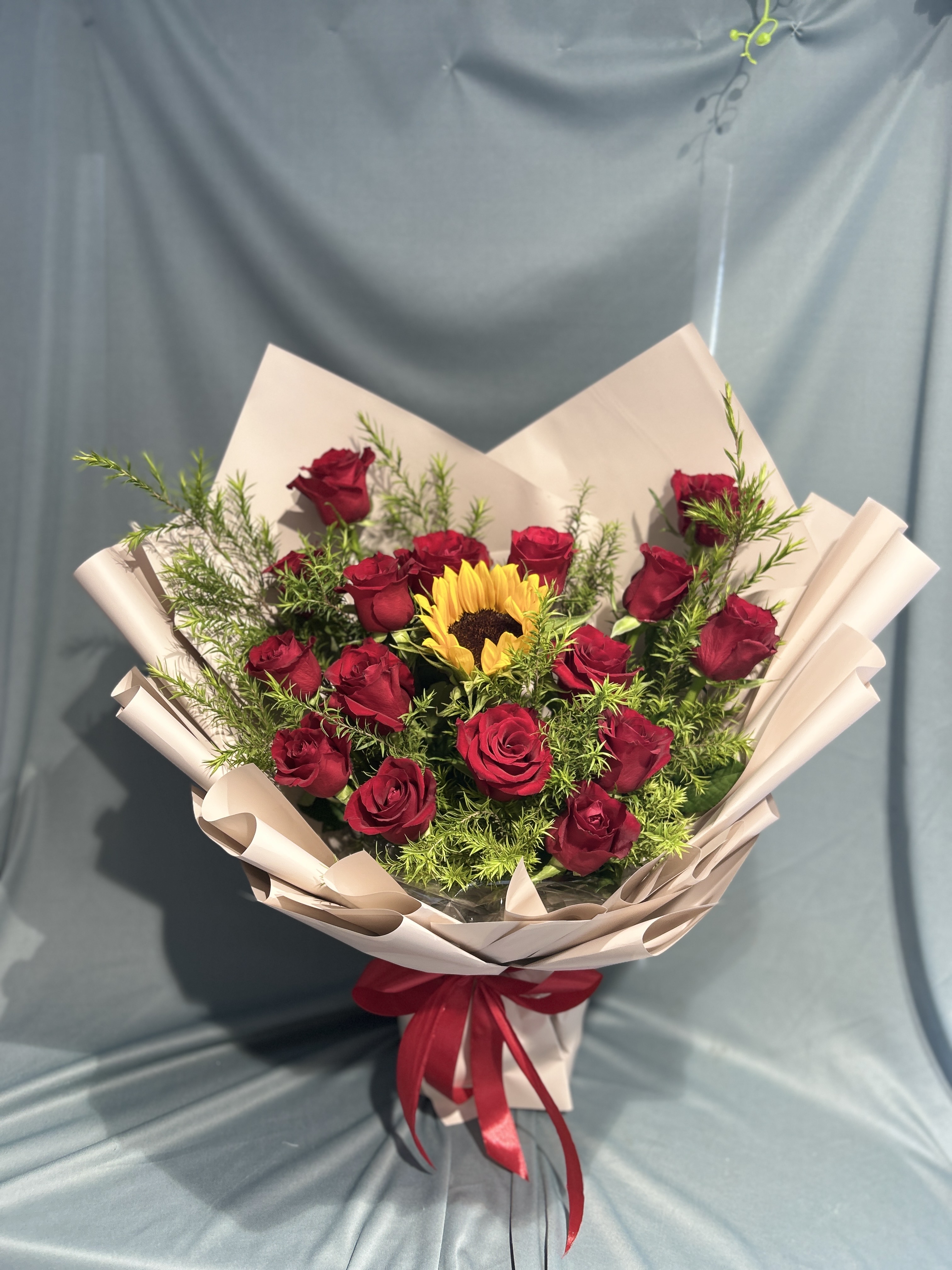 Sunflower within red gerden