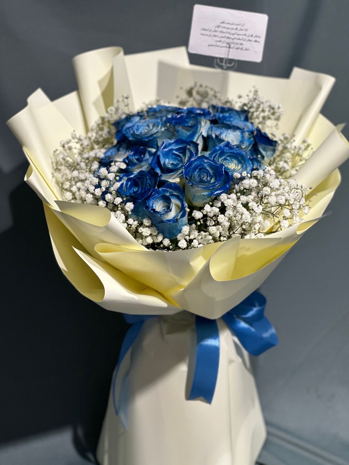 Blue roses hand bouquet