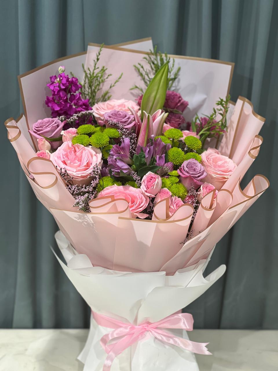 Purple, pink and green mix stunning bouquet