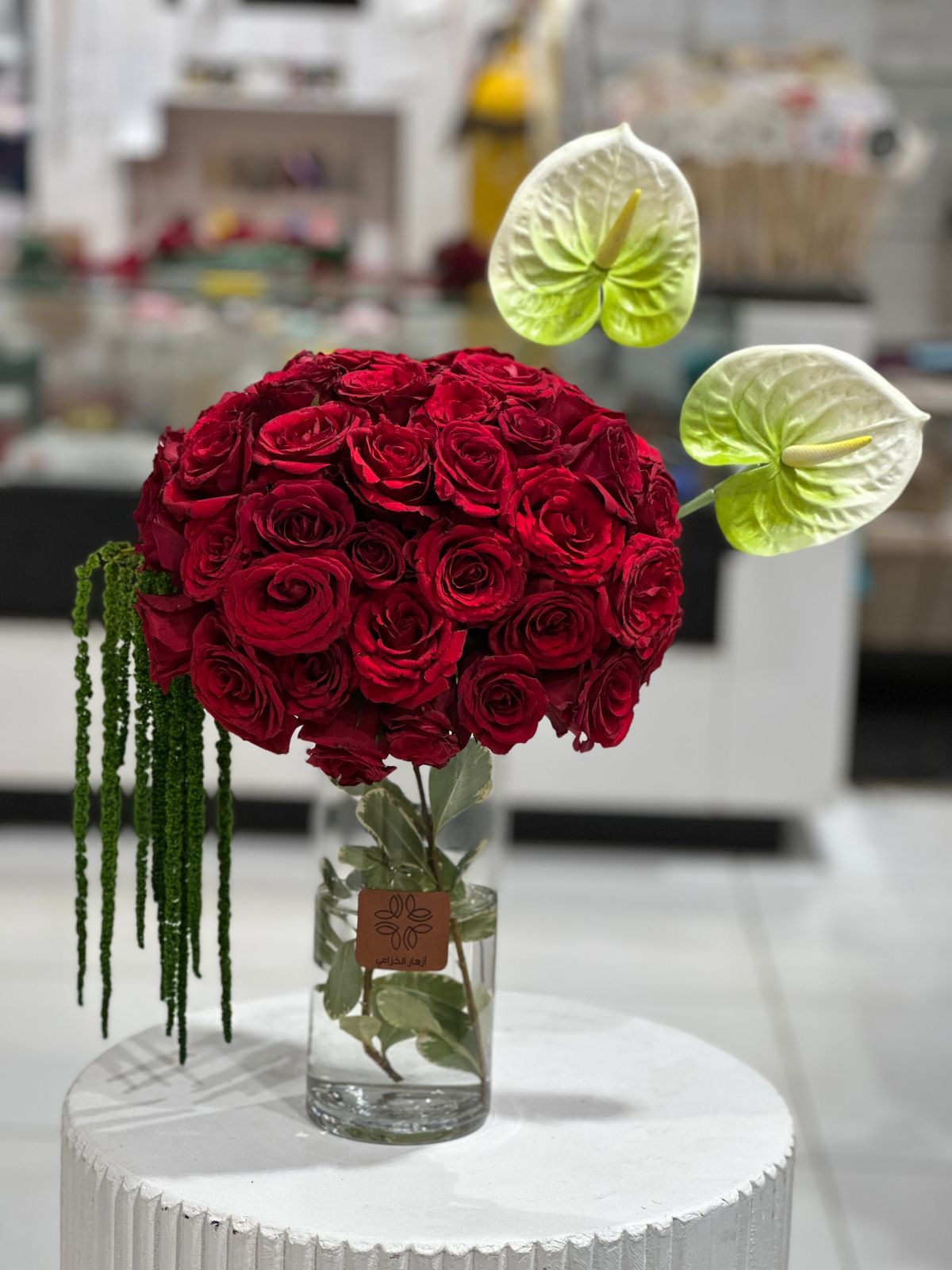 Red roses and  simba Anthurium  flowers vase