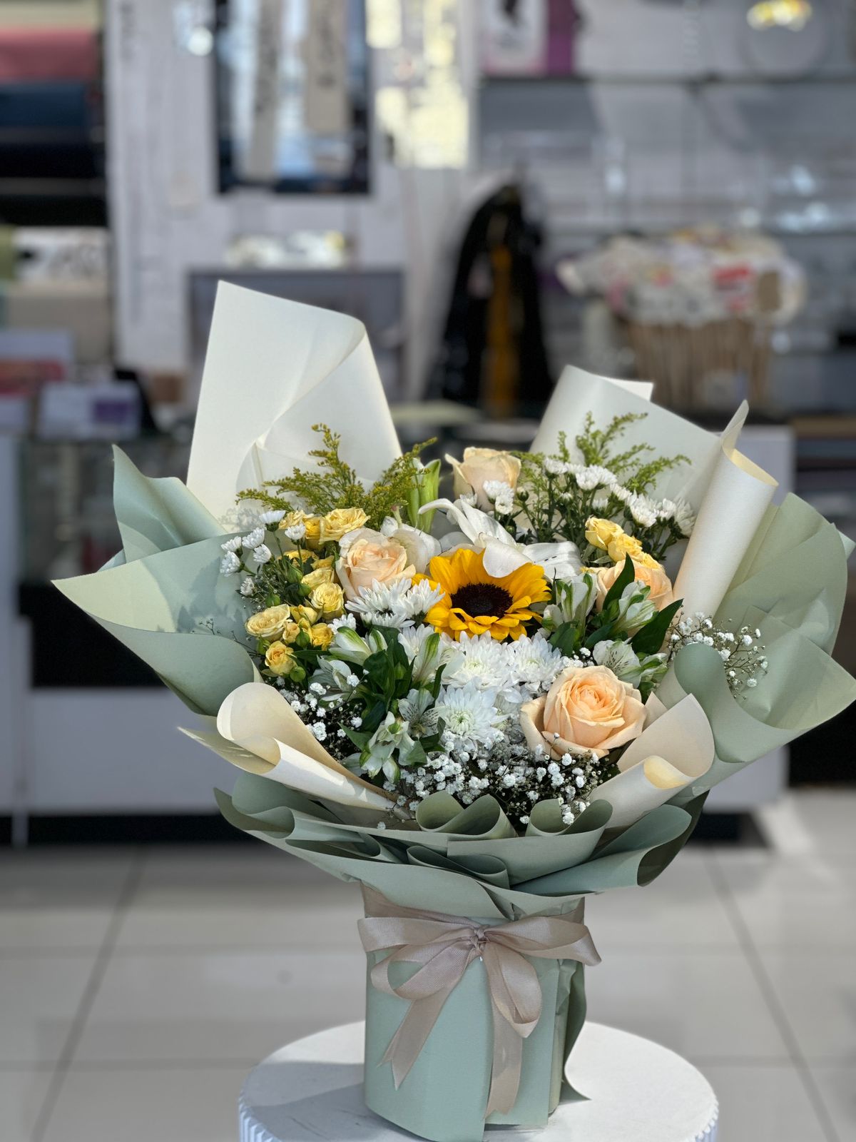 Sunflower within  mix flowers bouquet