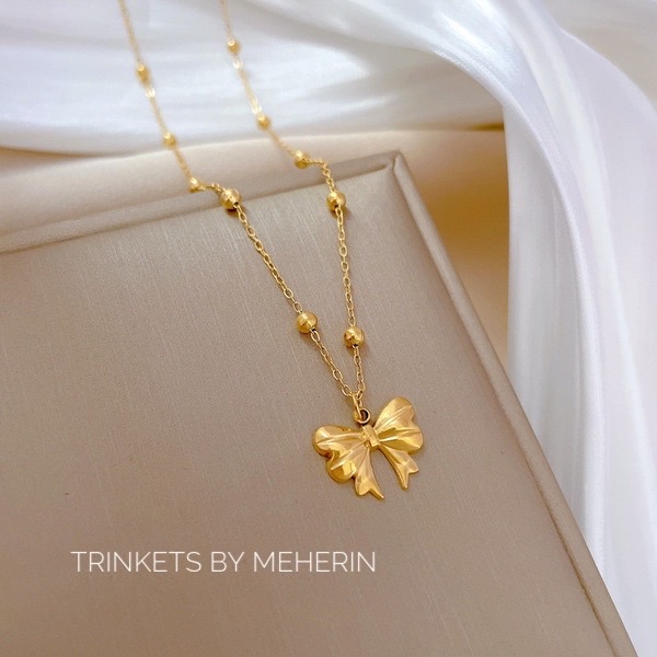 Bow/pookie neckpiece_img_3