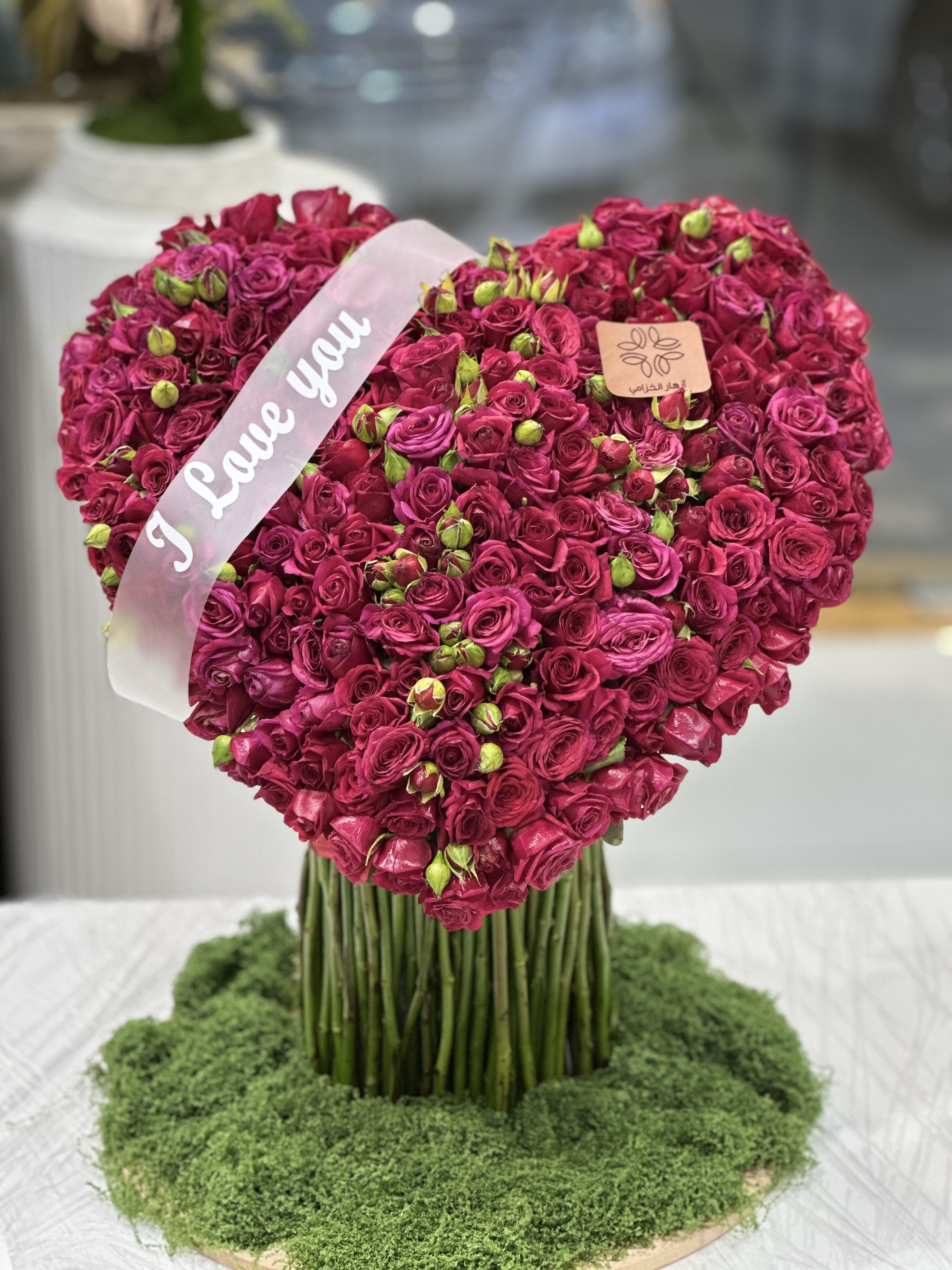 Red spray roses heart stand