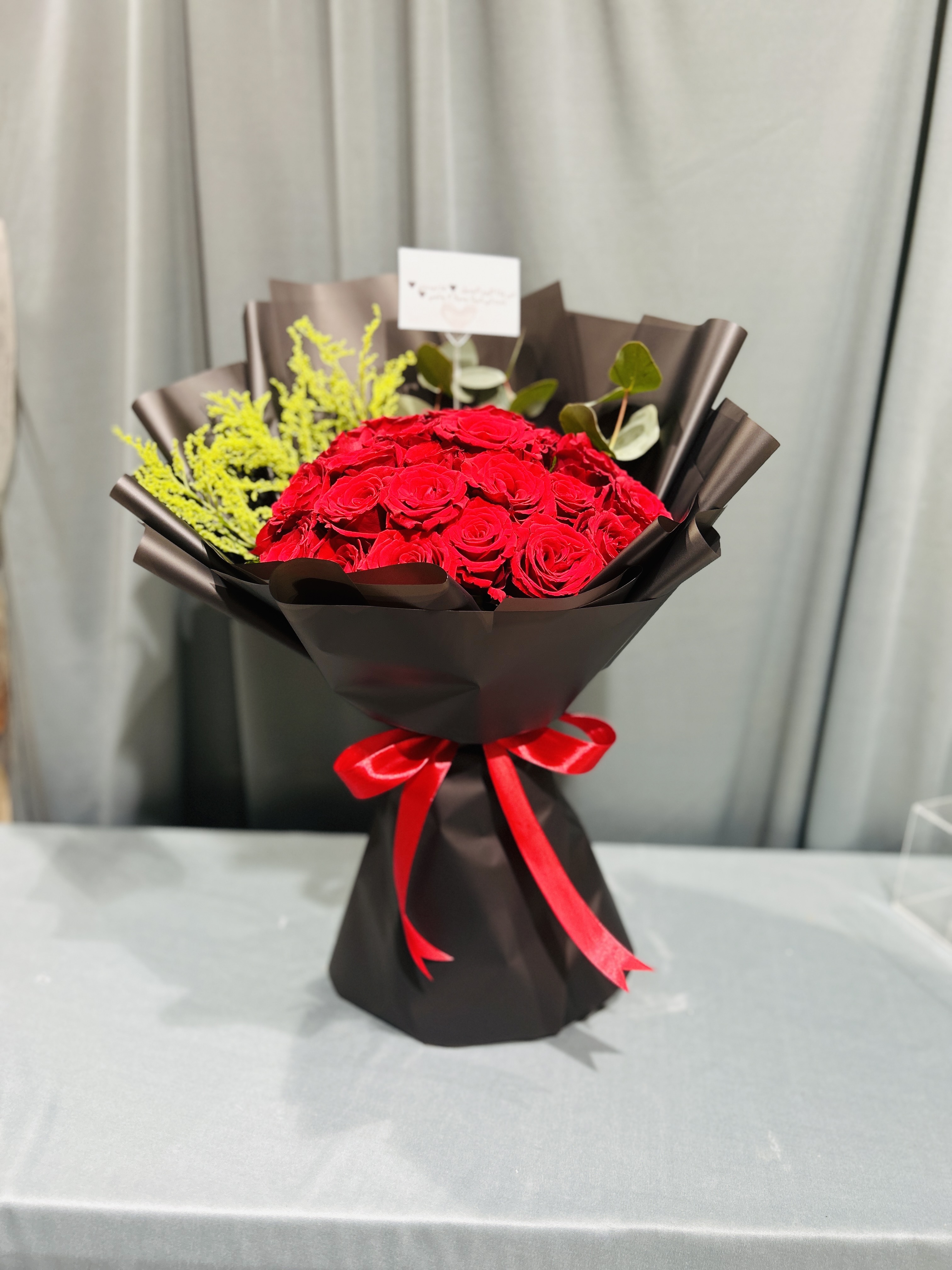 Red and black hand bouquet