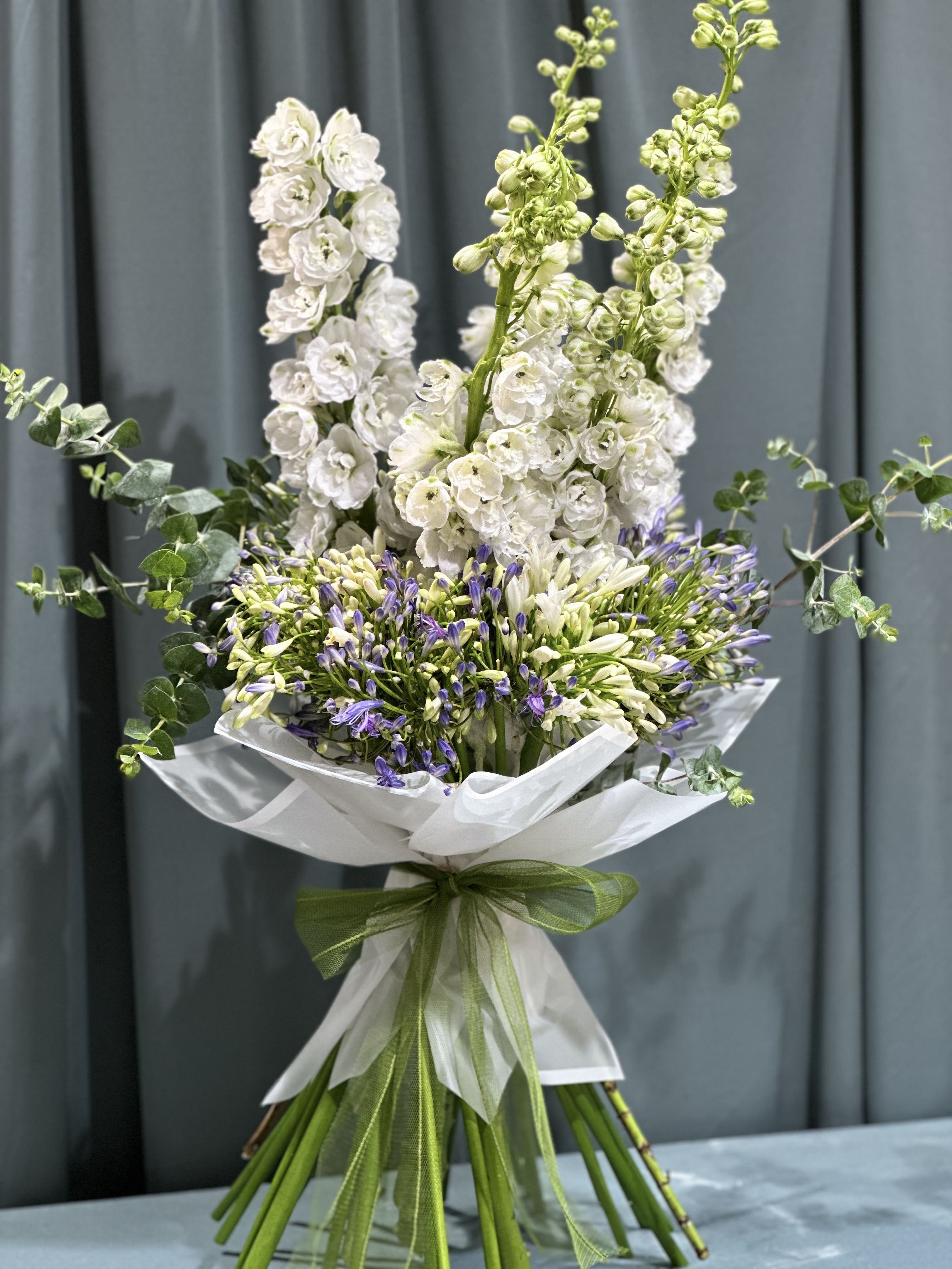 DELPHINIUM AND AGAPANTHUS FLOWERS HAND BOUQUET