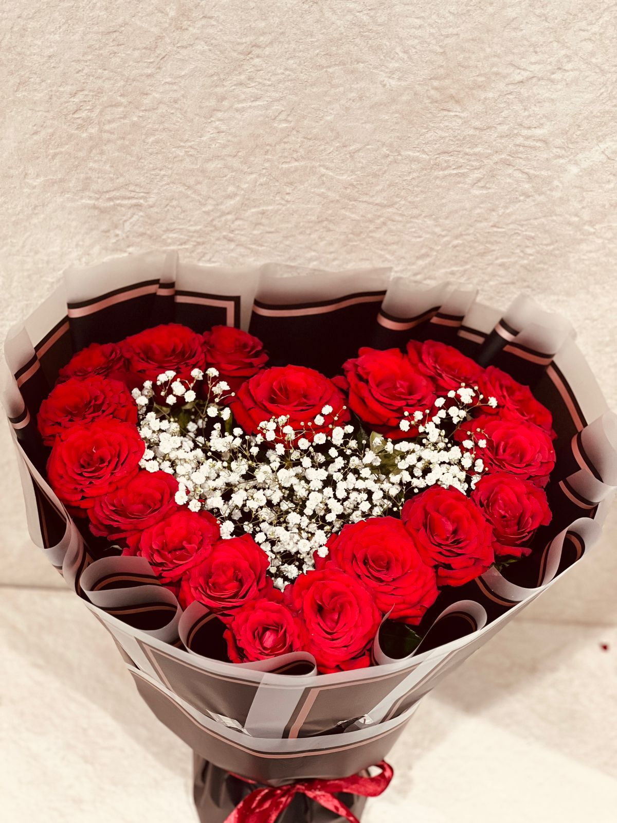 Red roses heart shape stunning bouquet