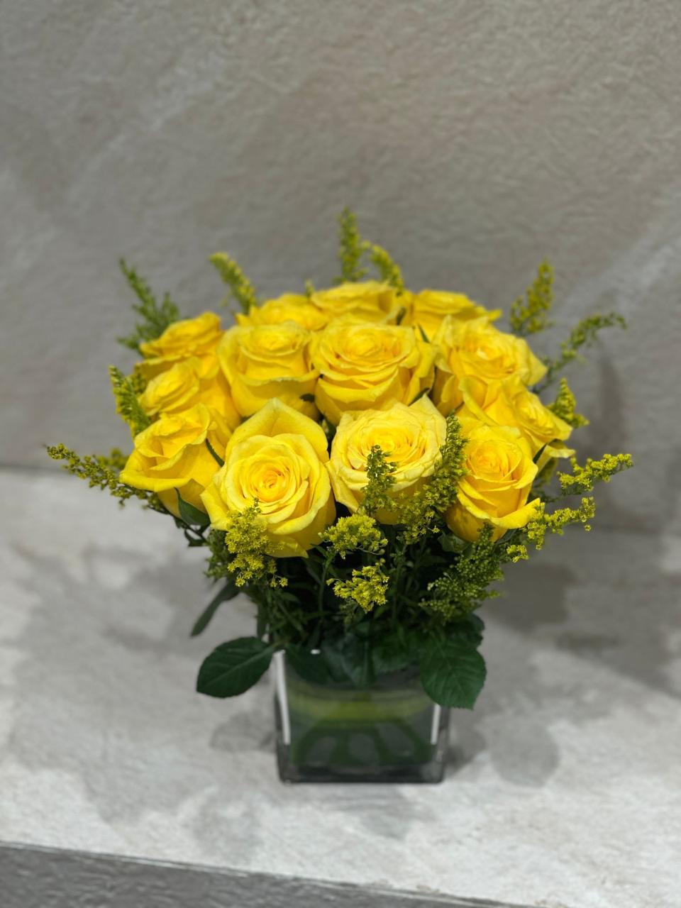 Yellow rose flowers vase