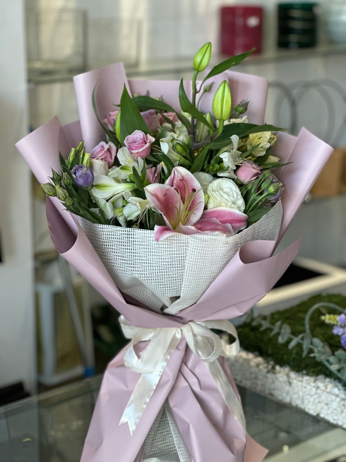 white and lite purple mix hand bouquet