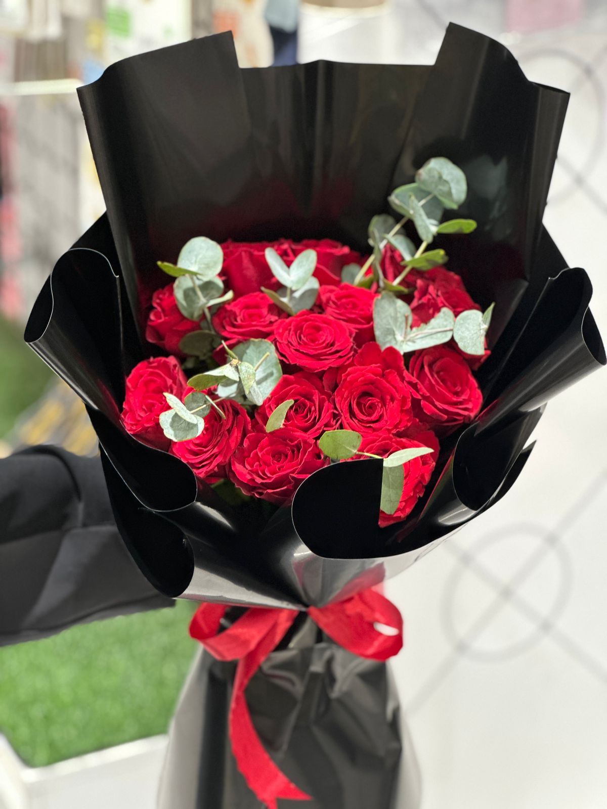 Red and black hand bouquet