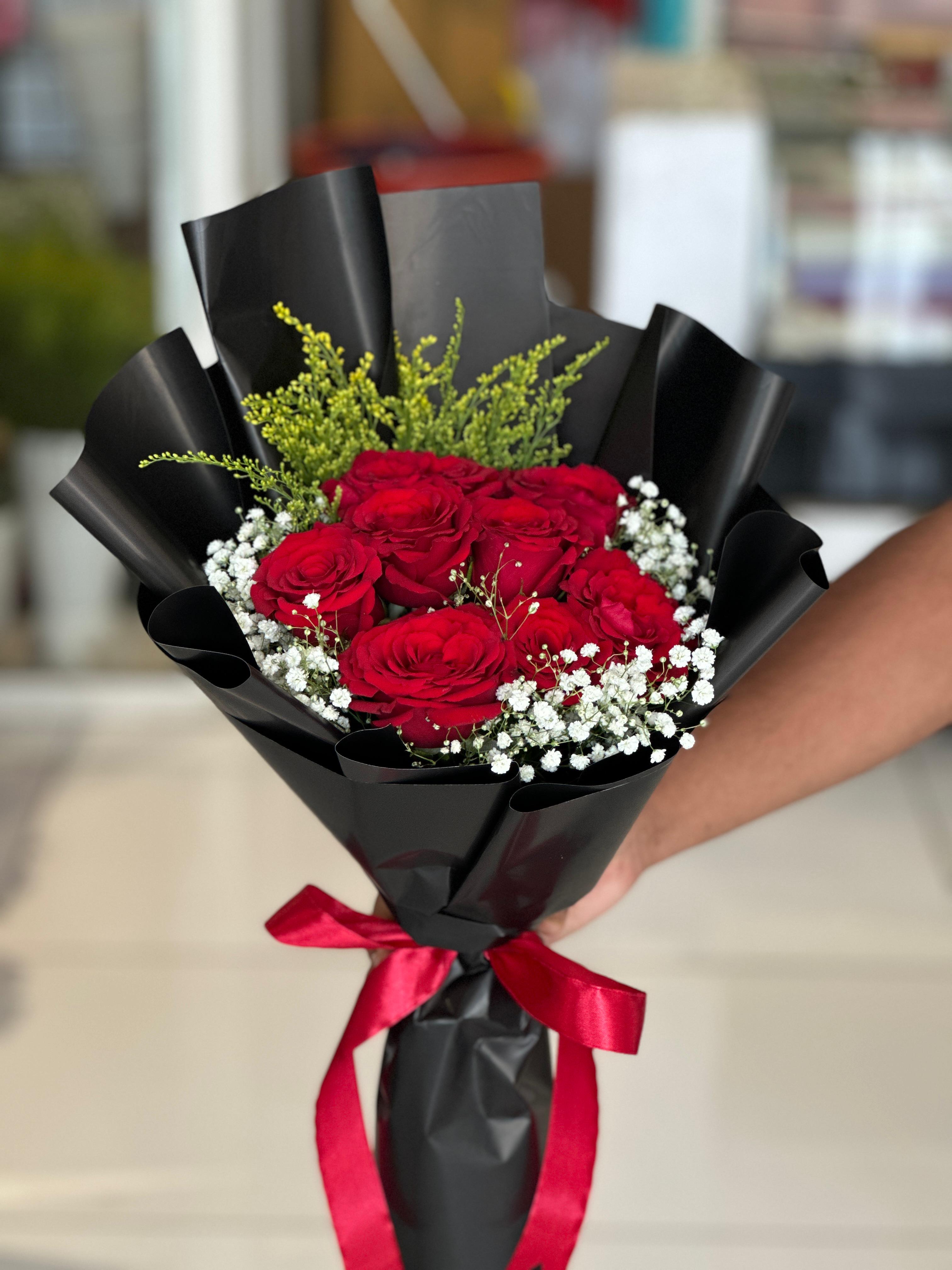 Red and black hand bouquet