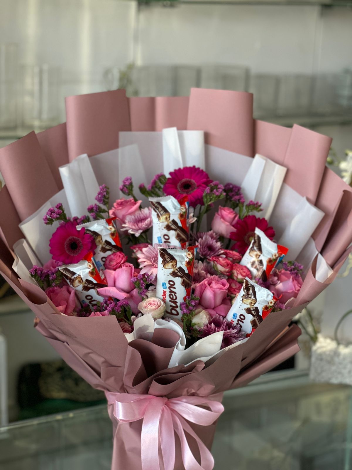 Purple and pink  flowers with chocolate stunning bouquet