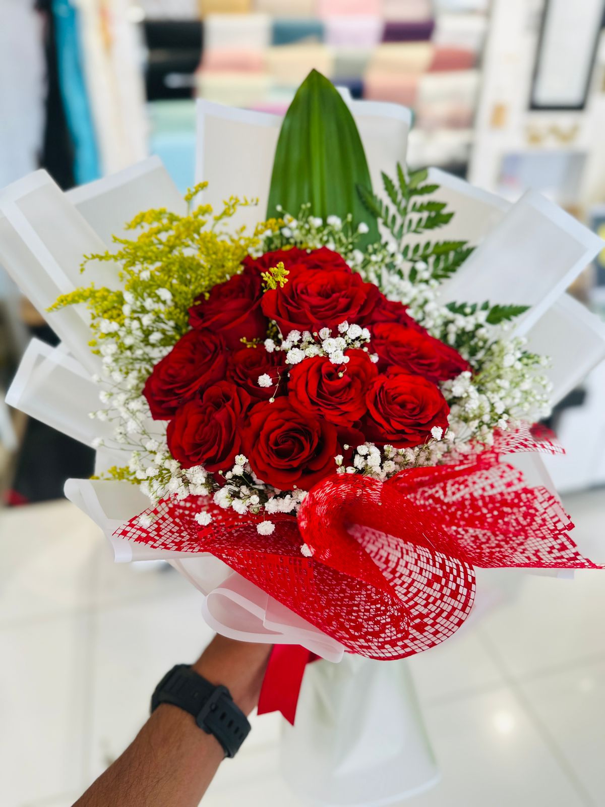 Red and white hand bouquet