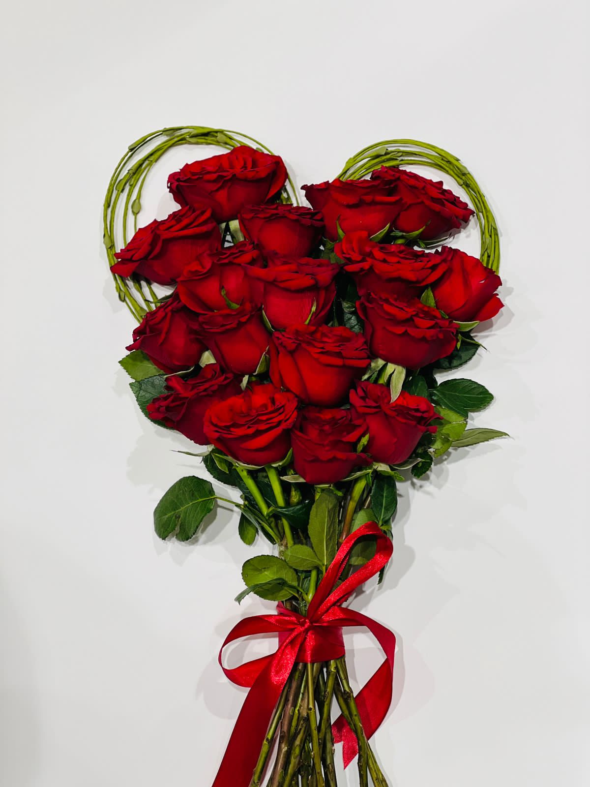 Red roses with stee grass Herat bouquet